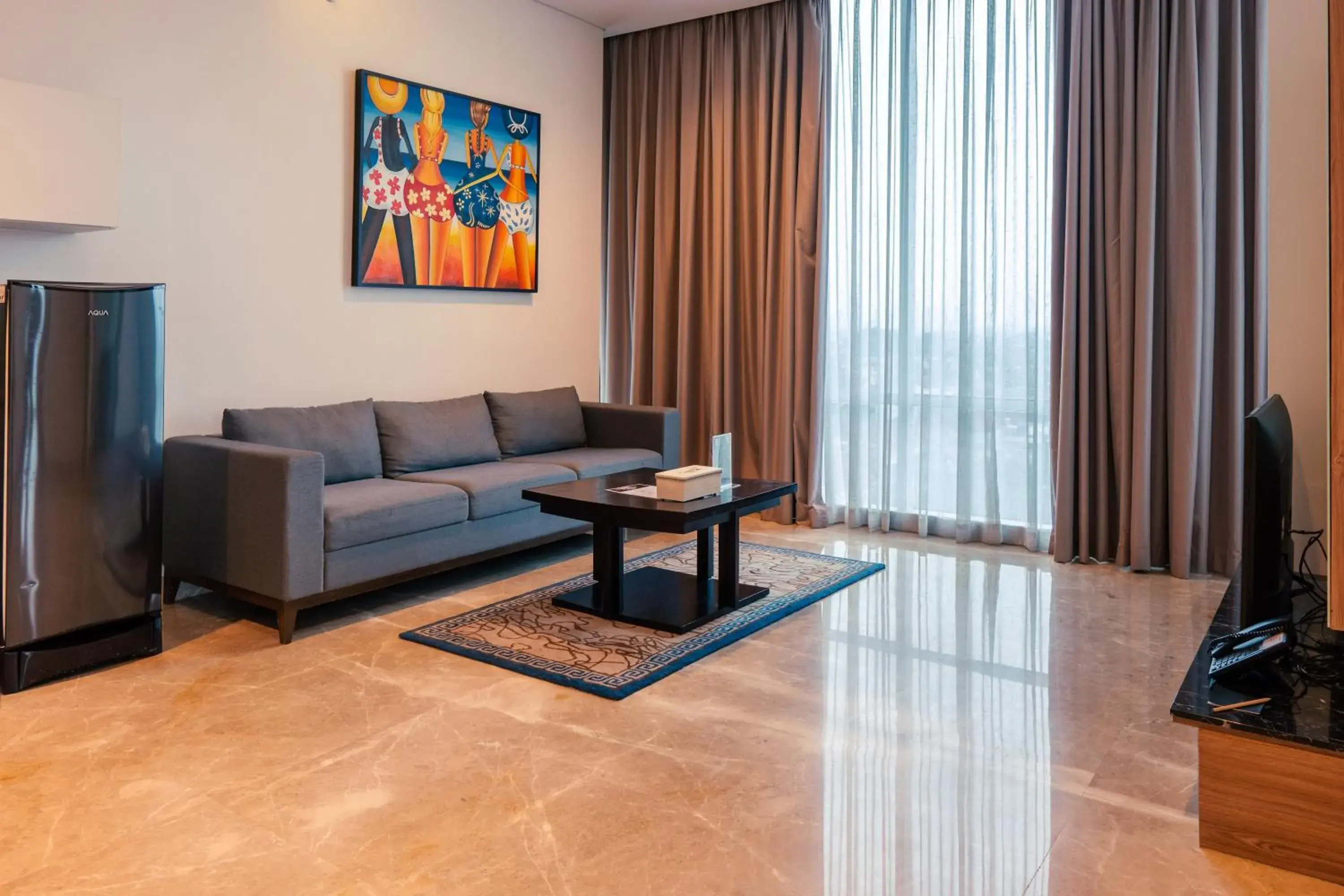 Living room in Azana Suites Hotel Antasari Living room in Azana Suites Hotel Antasari