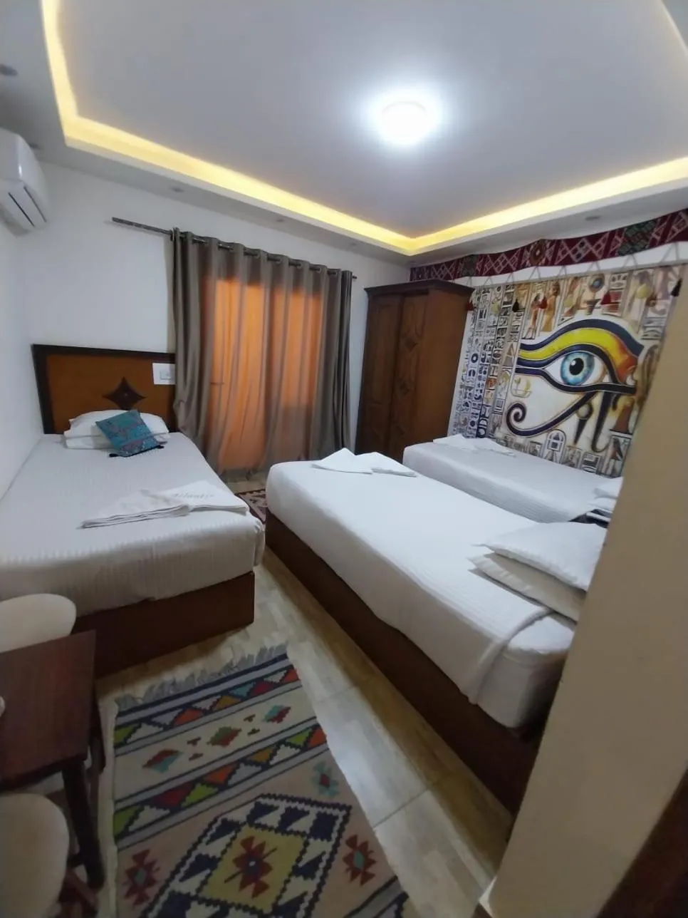 Bed in Atlantis Pyramids Inn