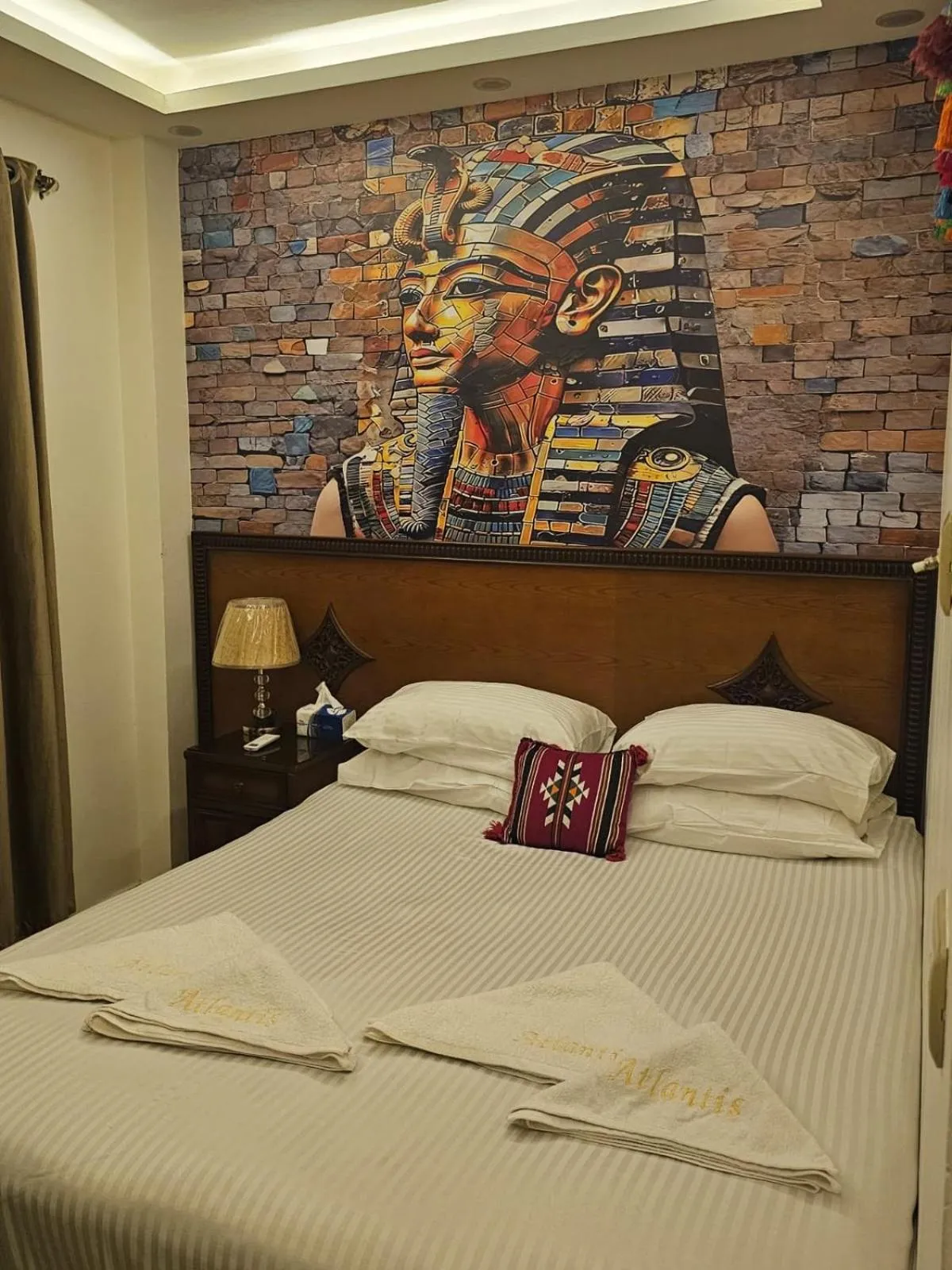 Bed in Atlantis Pyramids Inn