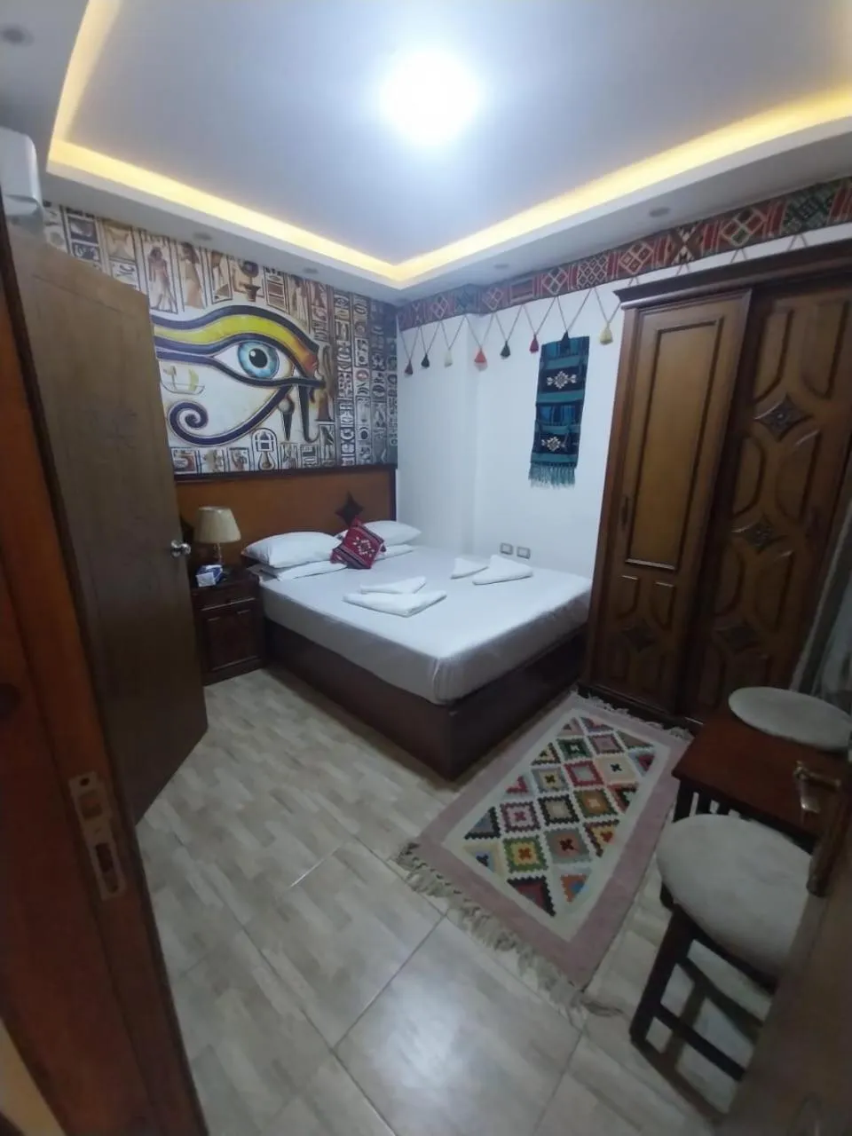 Bed in Atlantis Pyramids Inn