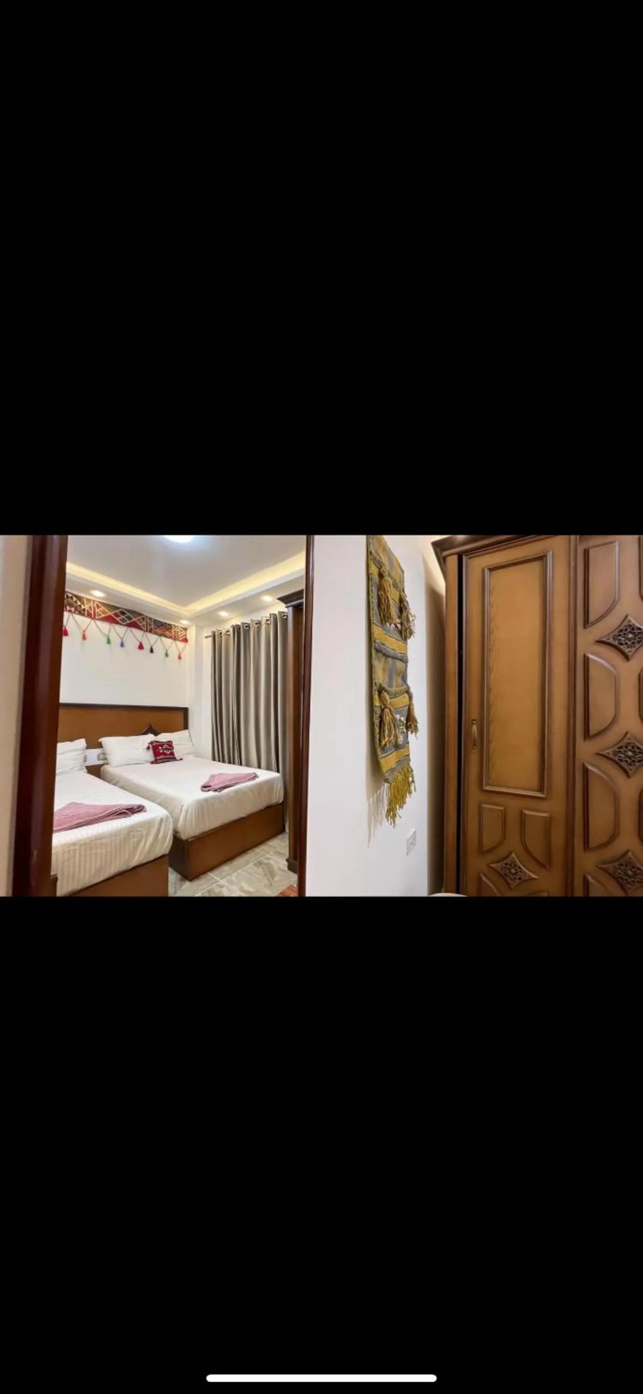 Bed in Atlantis Pyramids Inn