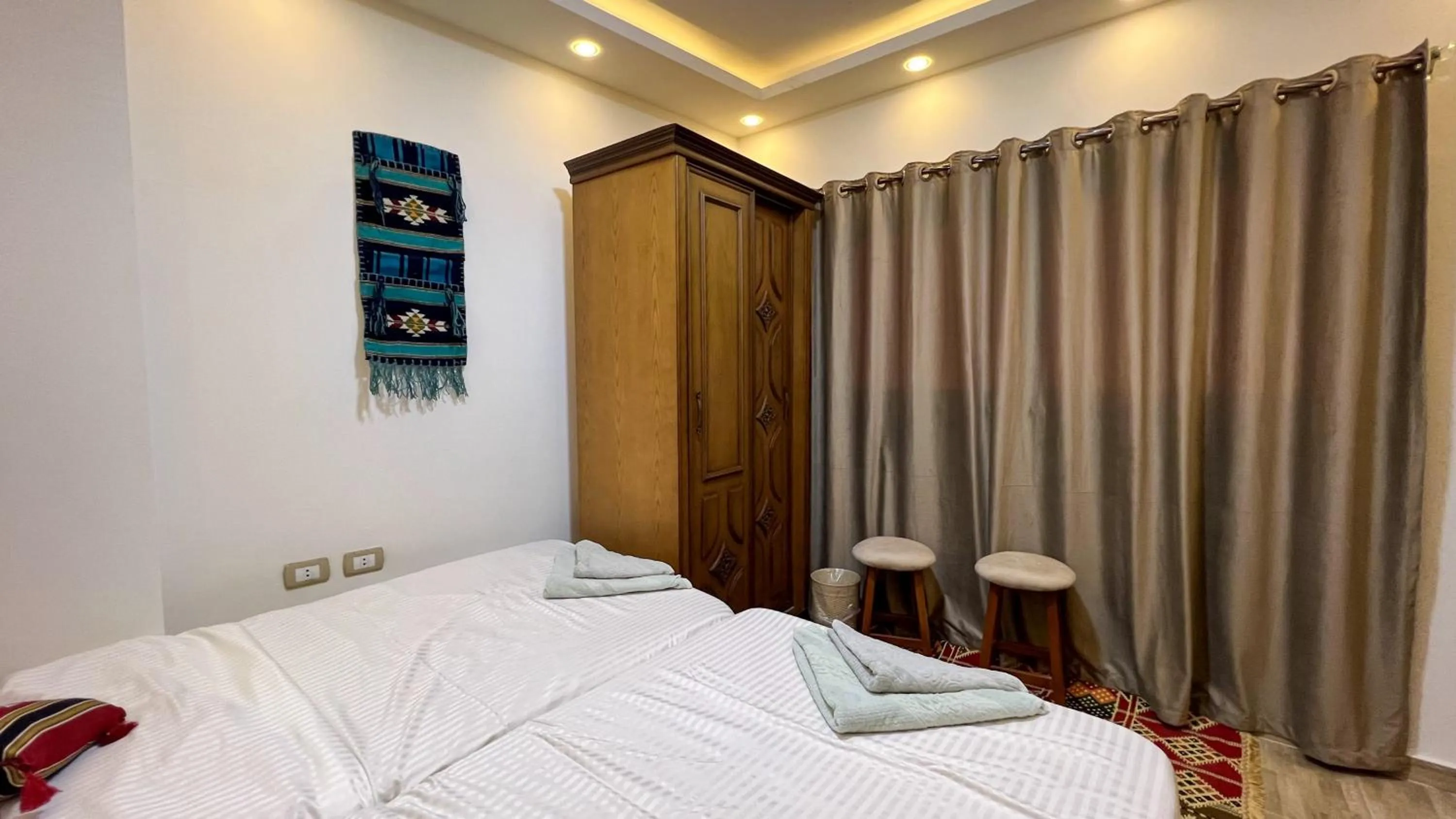 Bed in Atlantis Pyramids Inn