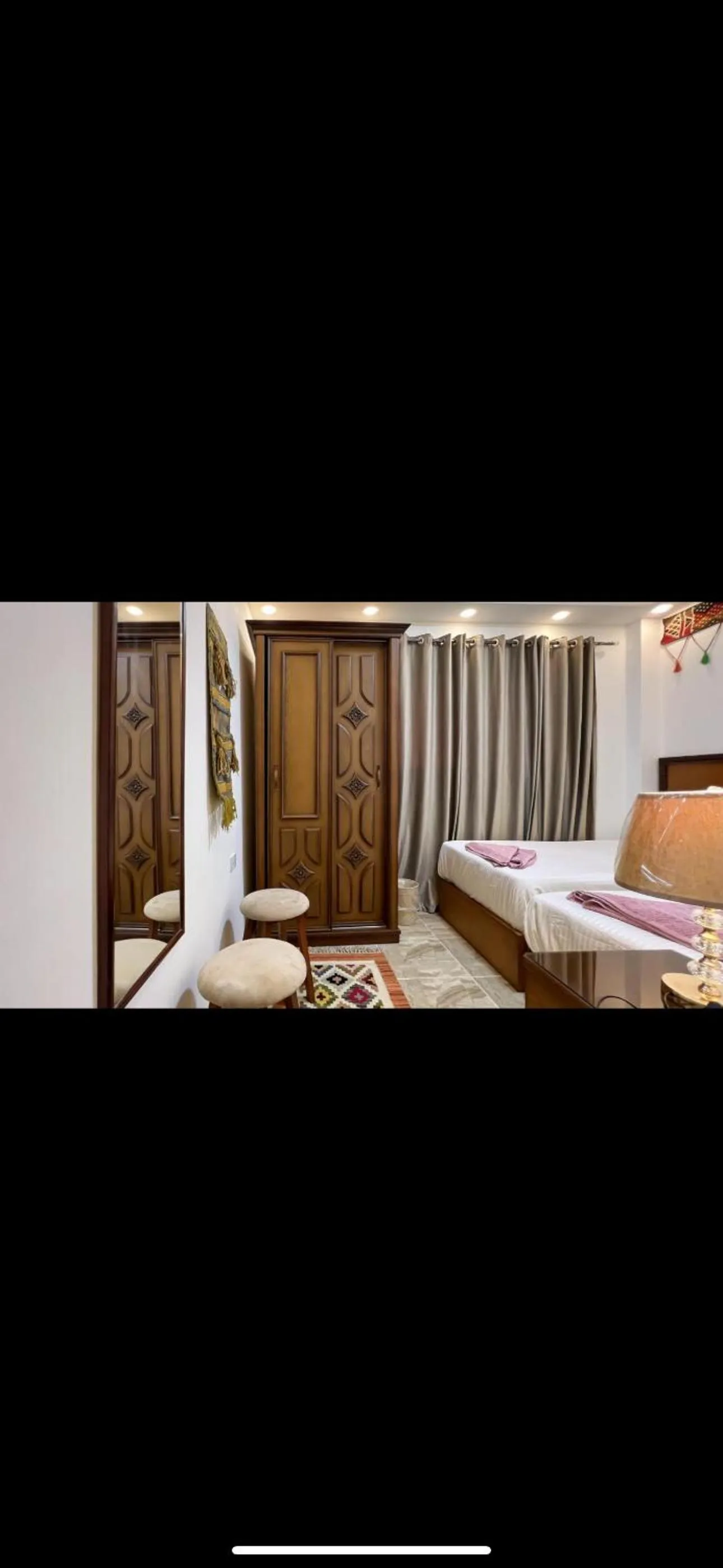 Bed in Atlantis Pyramids Inn