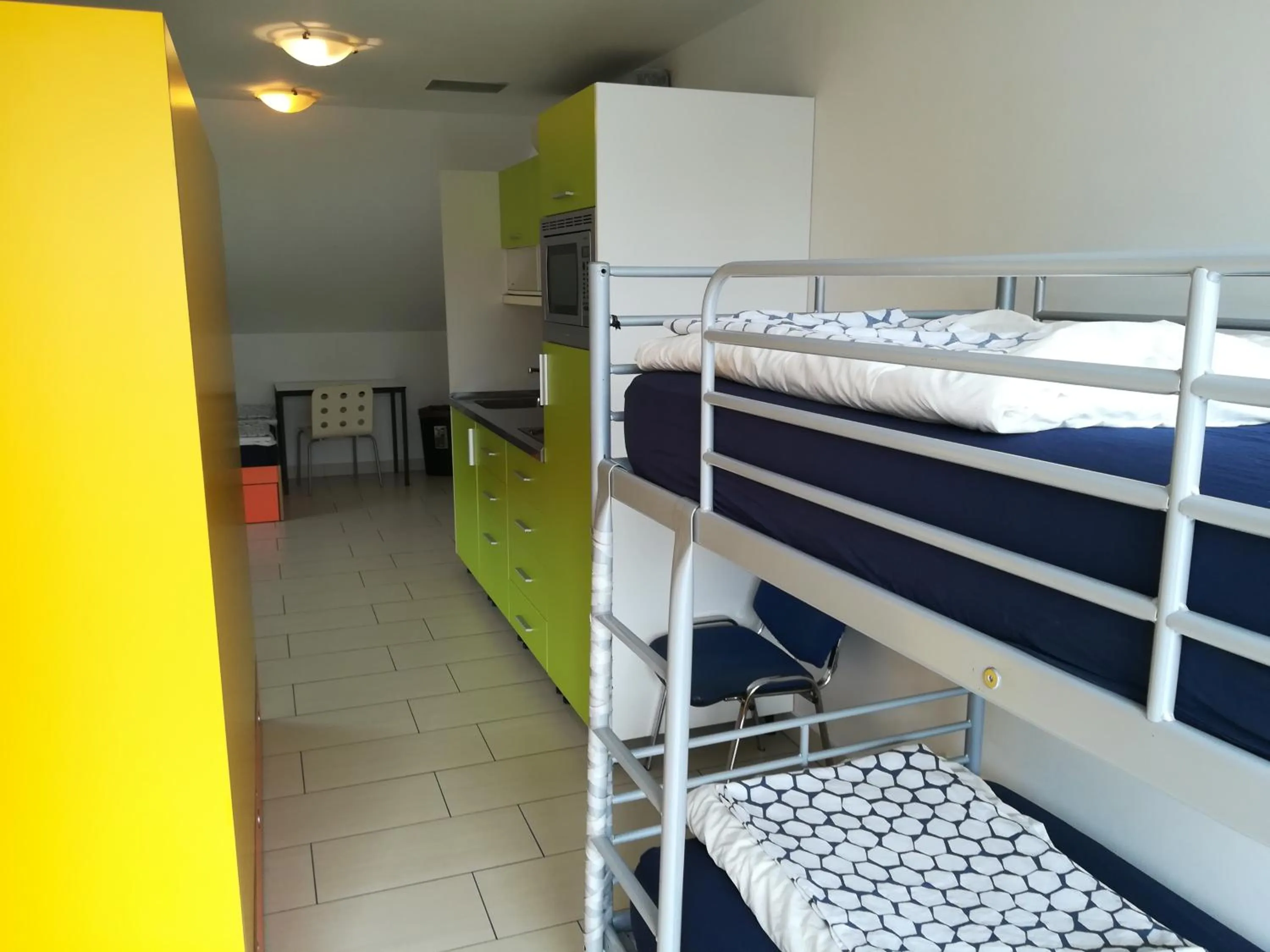 Kitchen or kitchenette, Bed in Simbol Rooms with free private parking