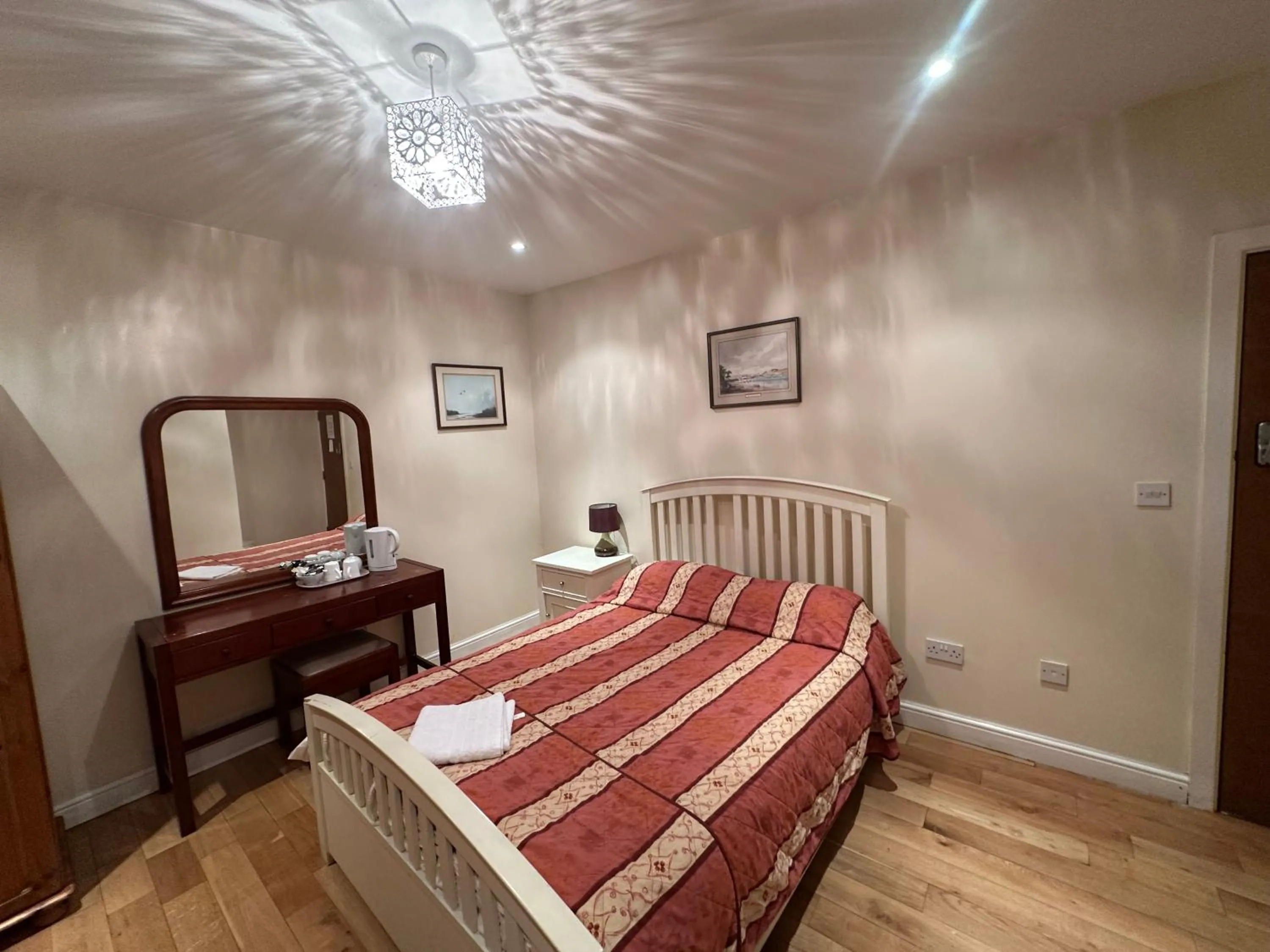 Bed in The Dharma Lodge