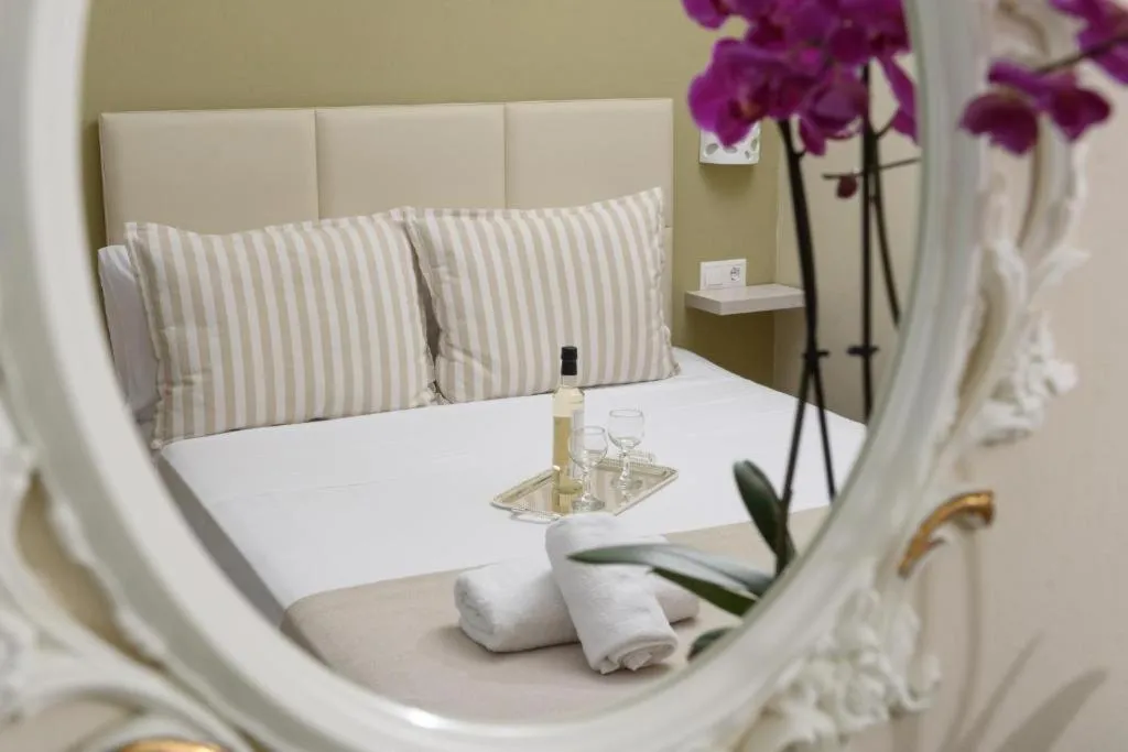 Photo of the whole room, Bed in Ammos Beach Seaside Luxury Suites Hotel