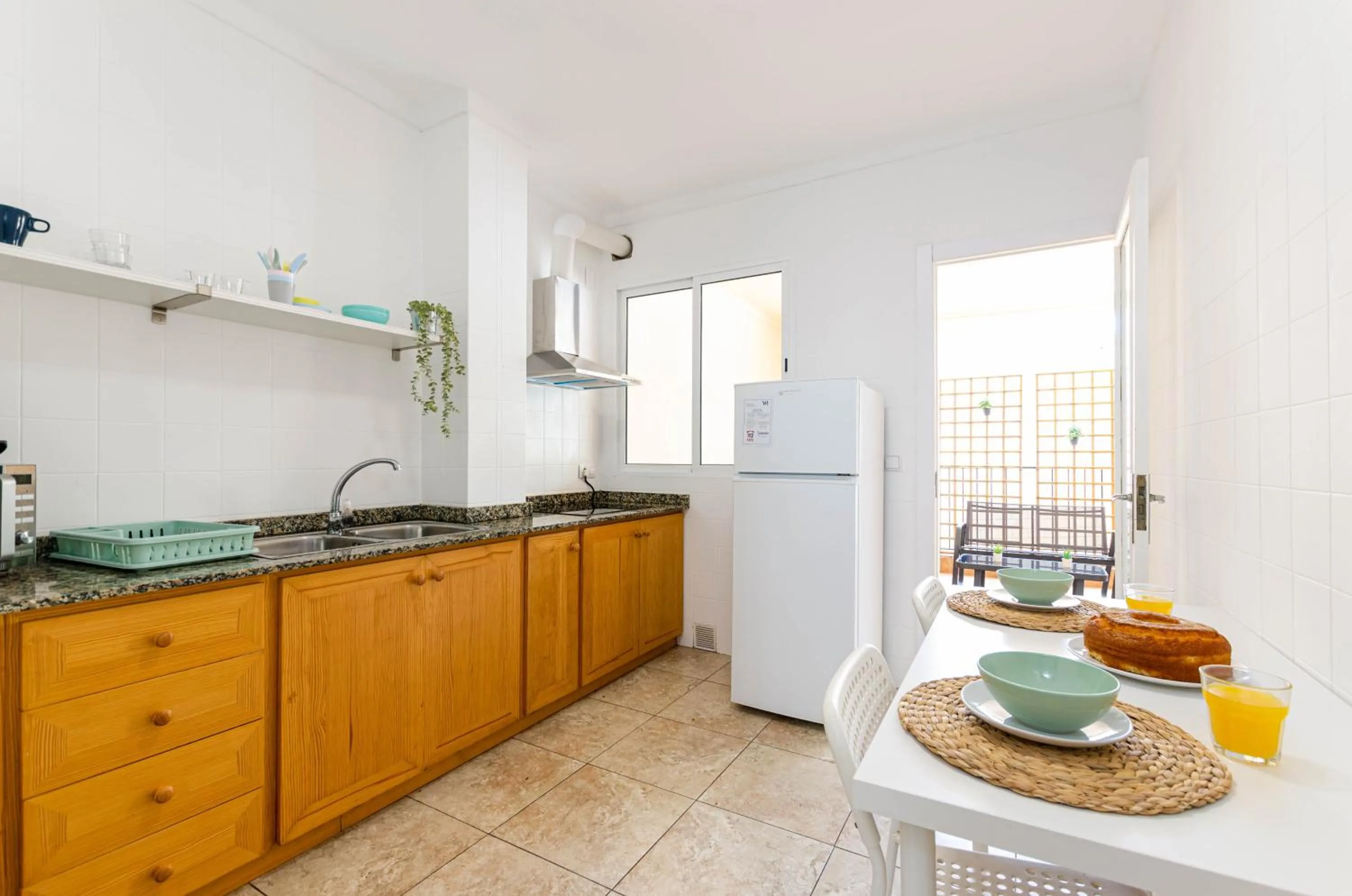 Kitchen or kitchenette in Port Apartments