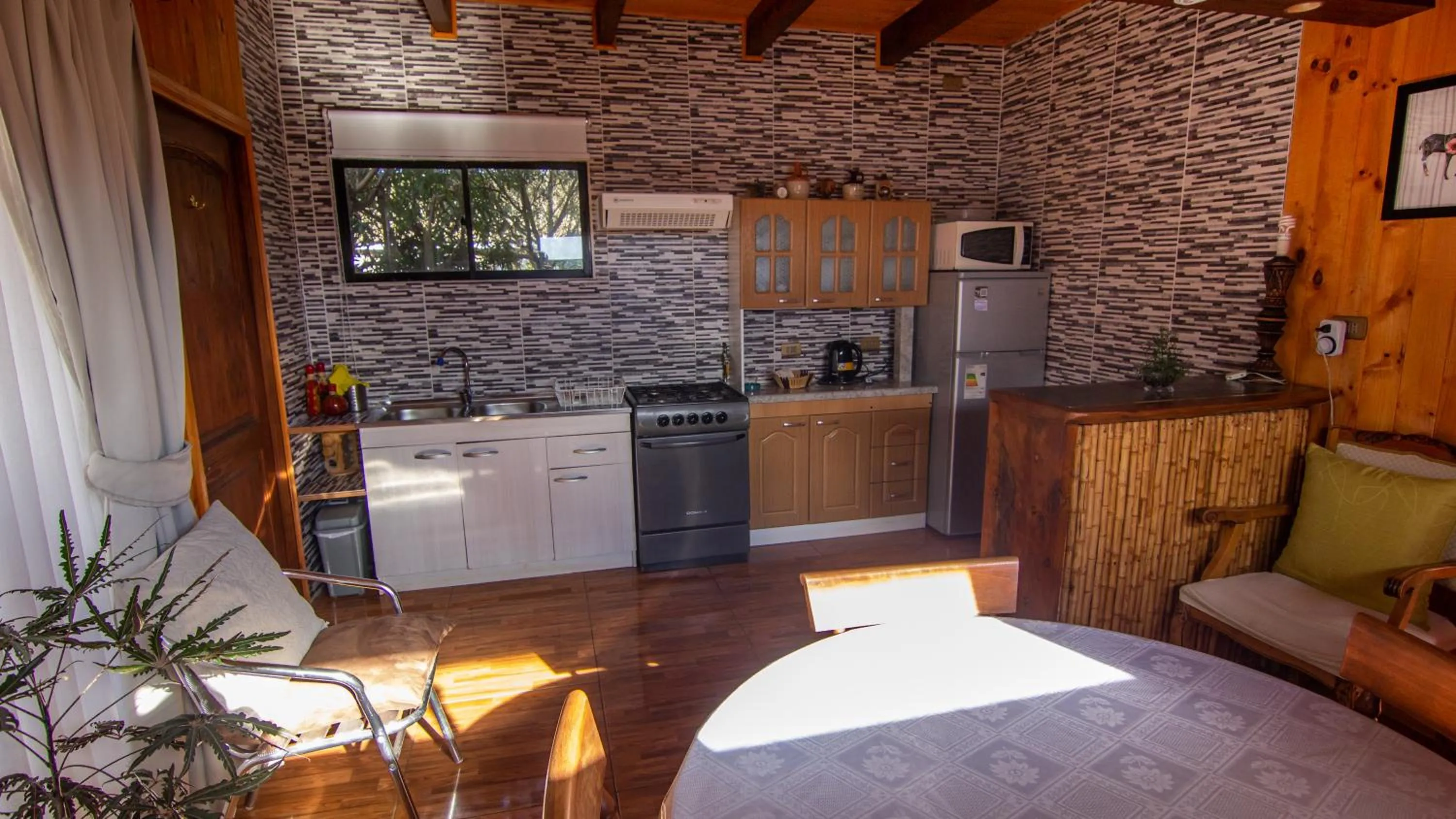 Kitchen or kitchenette, Bed in ELUNEY Pichilemu