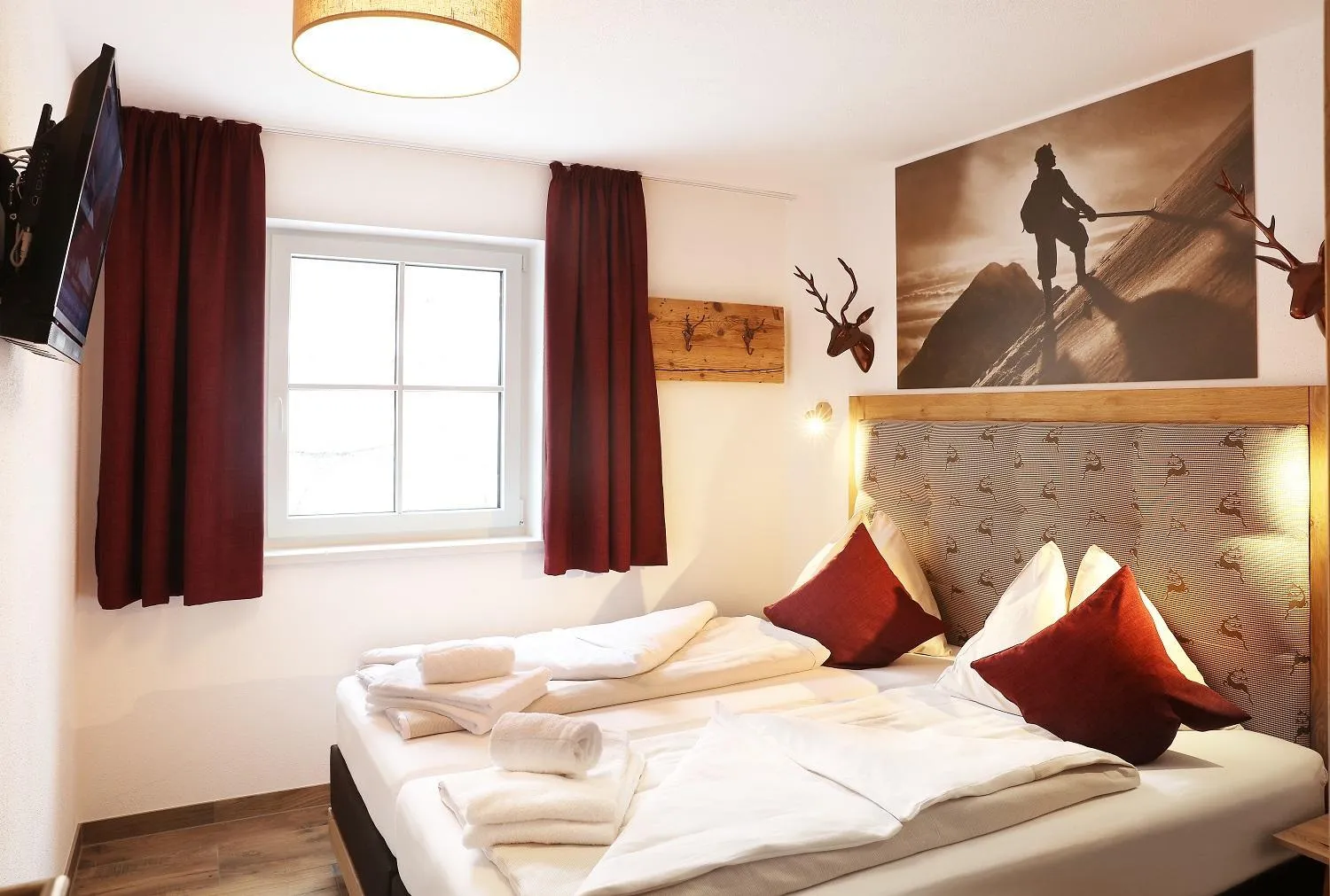 Bed in Tauernsuites Mitterwirt by ALPS RESORTS