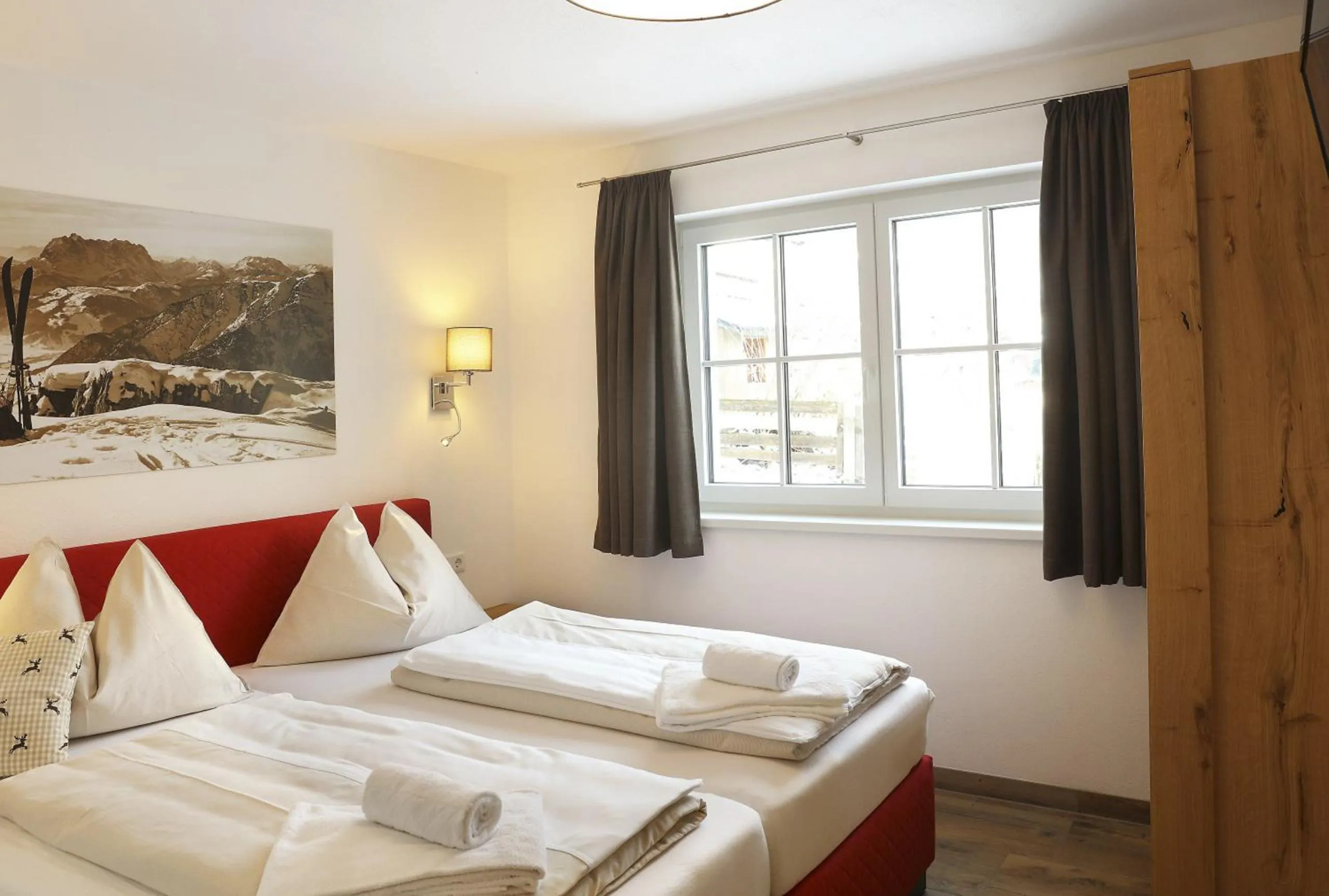 Bed in Tauernsuites Mitterwirt by ALPS RESORTS