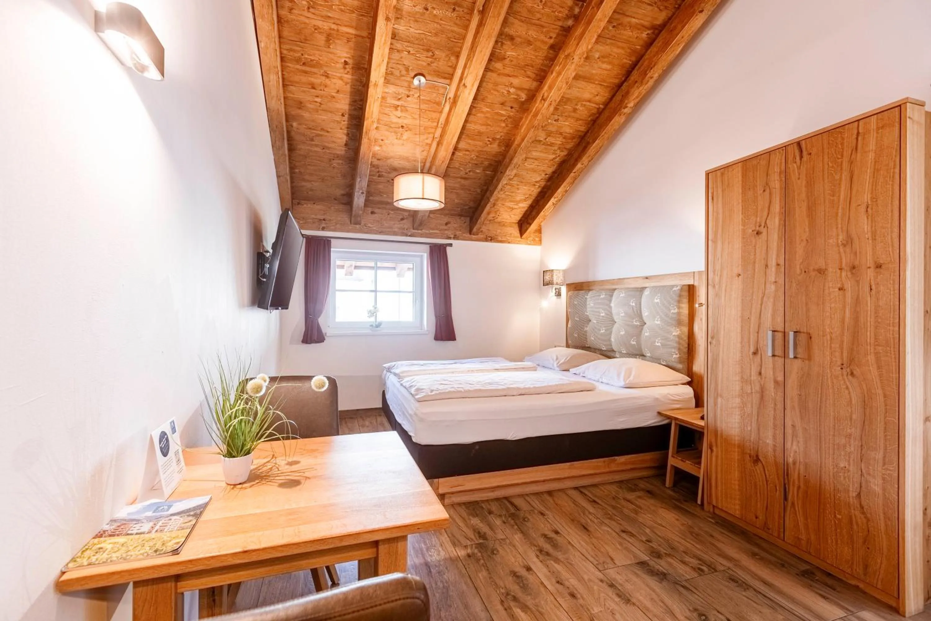 Bed in Tauernsuites Mitterwirt by ALPS RESORTS