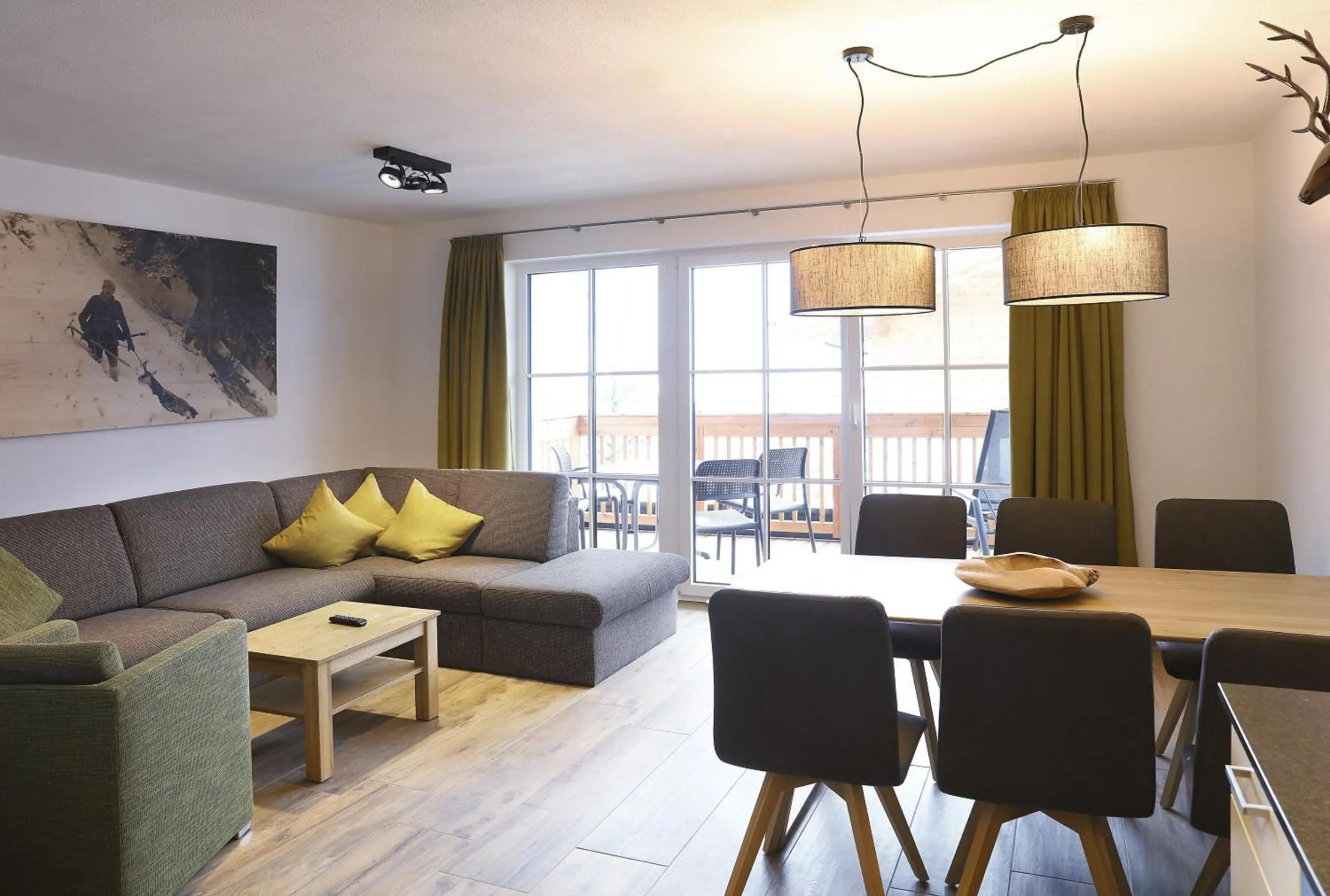 Living room in Tauernsuites Mitterwirt by ALPS RESORTS