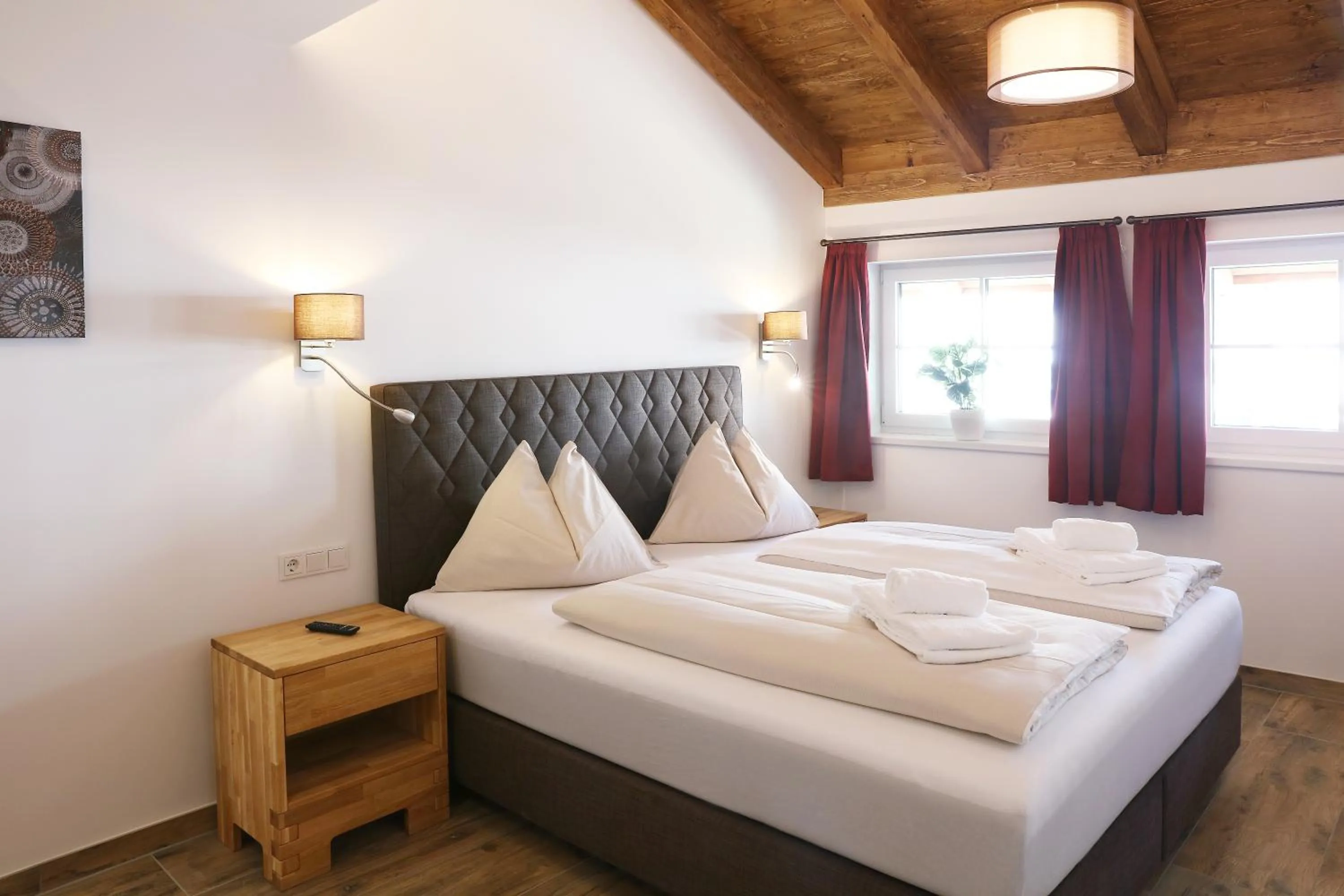 Bed in Tauernsuites Mitterwirt by ALPS RESORTS