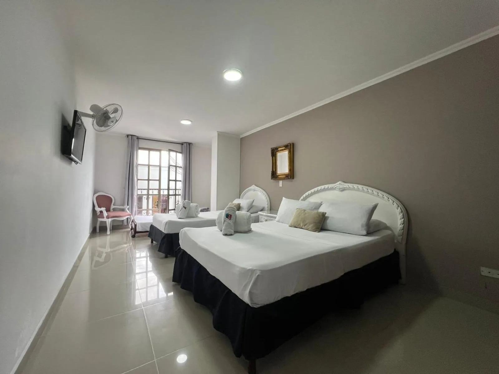 Standard Quadruple Room in Hotel Suite Santa Rosa