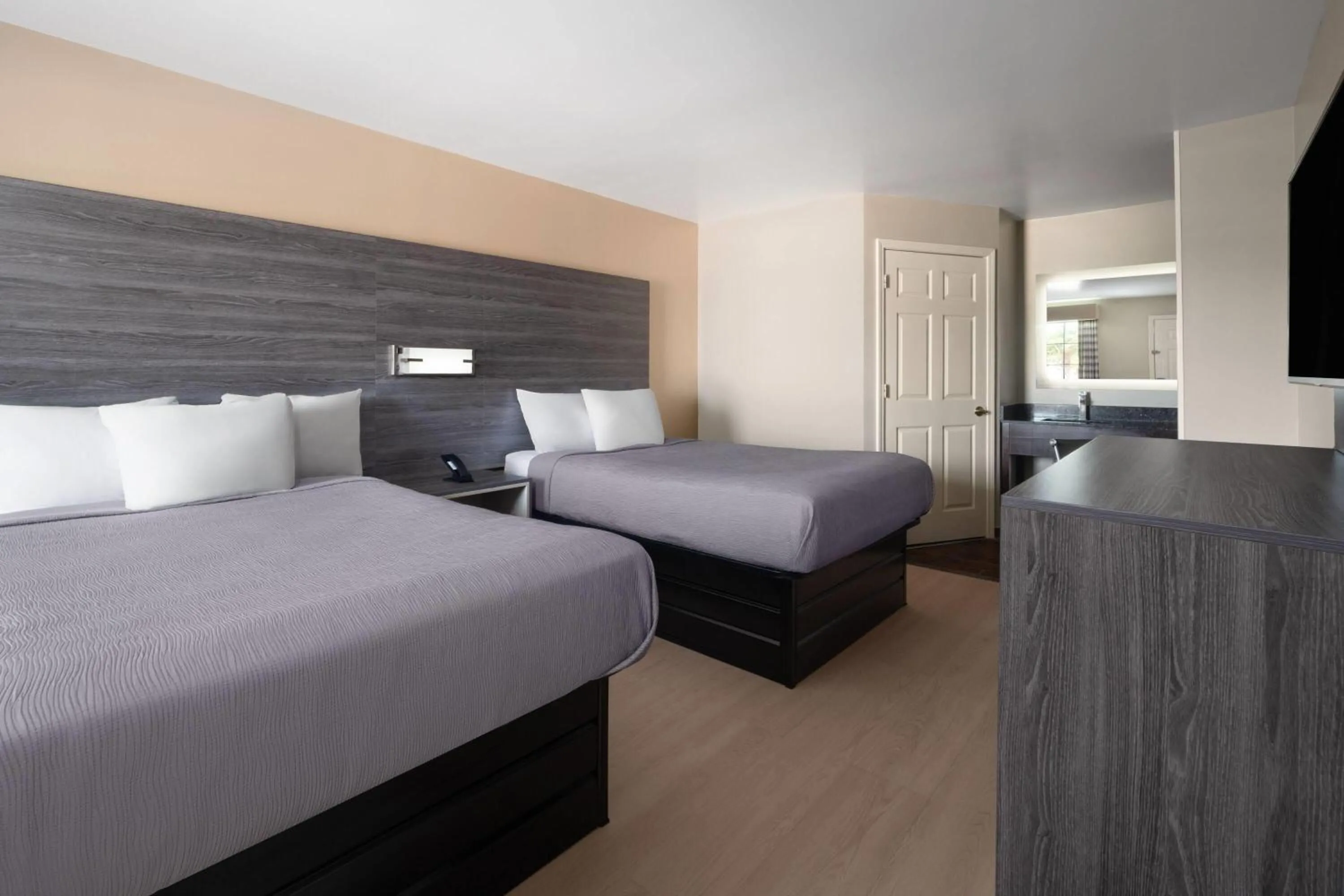 Photo of the whole room, Bed in Baymont by Wyndham Commerce GA Near Tanger Outlets Mall