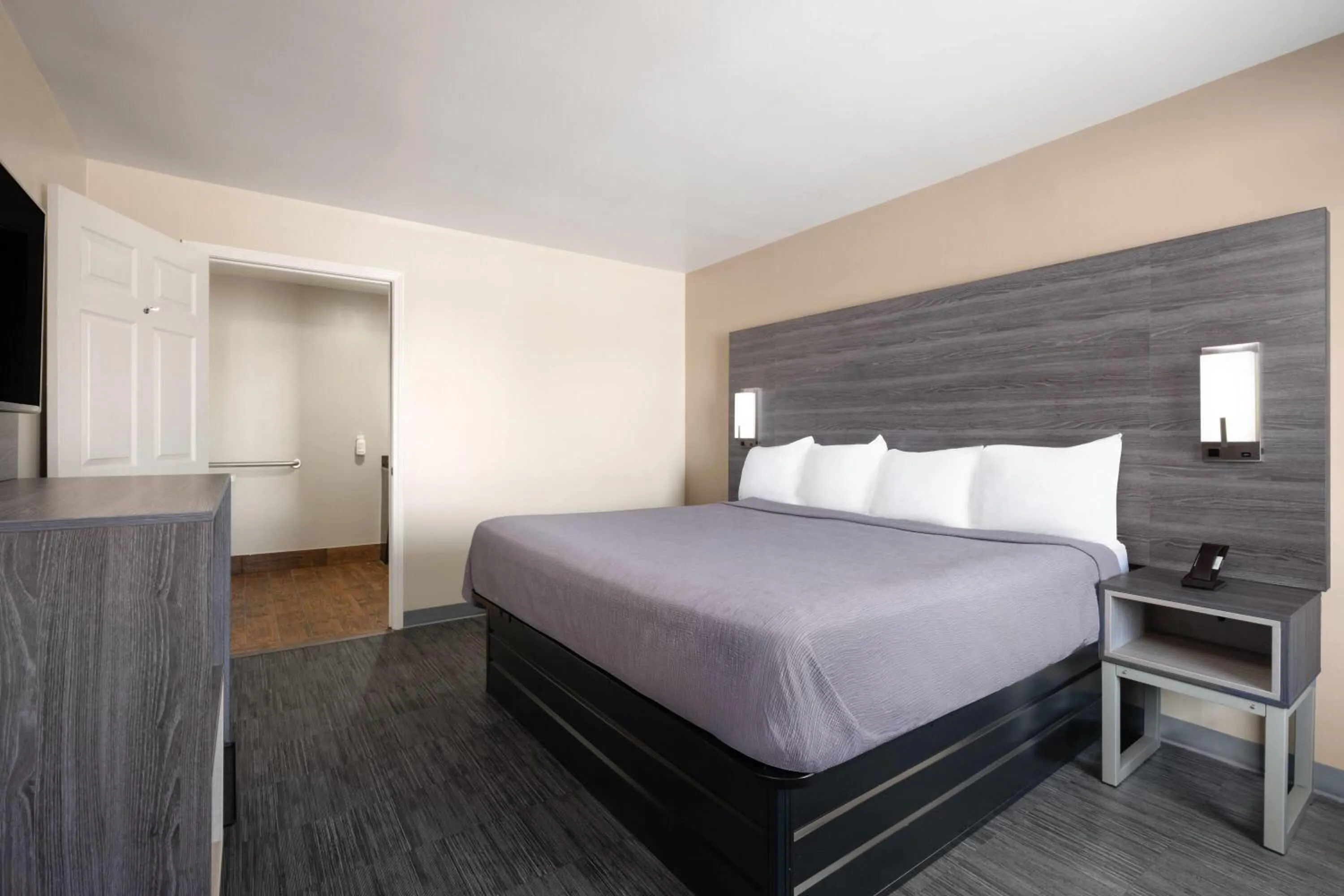 Photo of the whole room, Bed in Baymont by Wyndham Commerce GA Near Tanger Outlets Mall