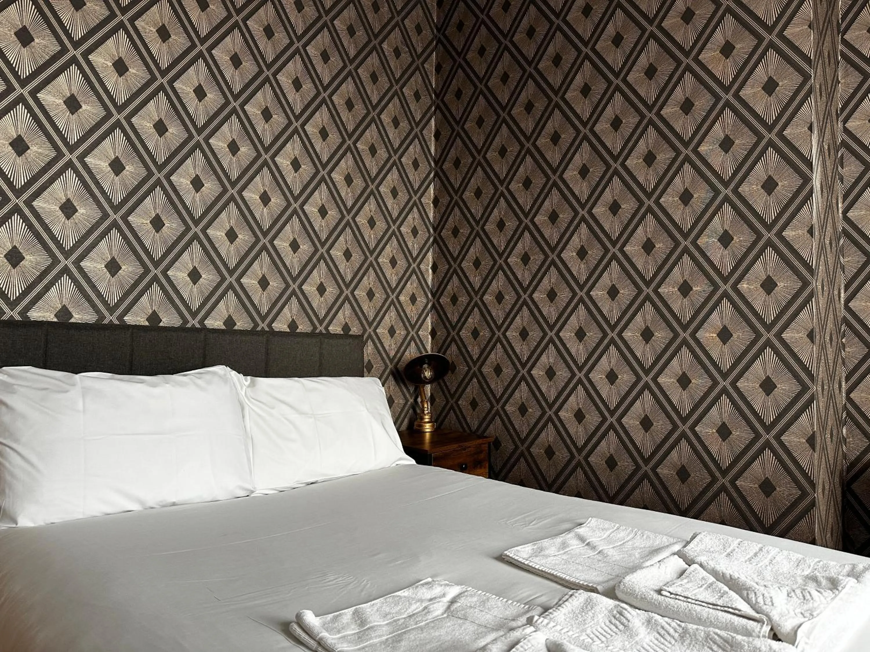 Bed in The Derby Hotel