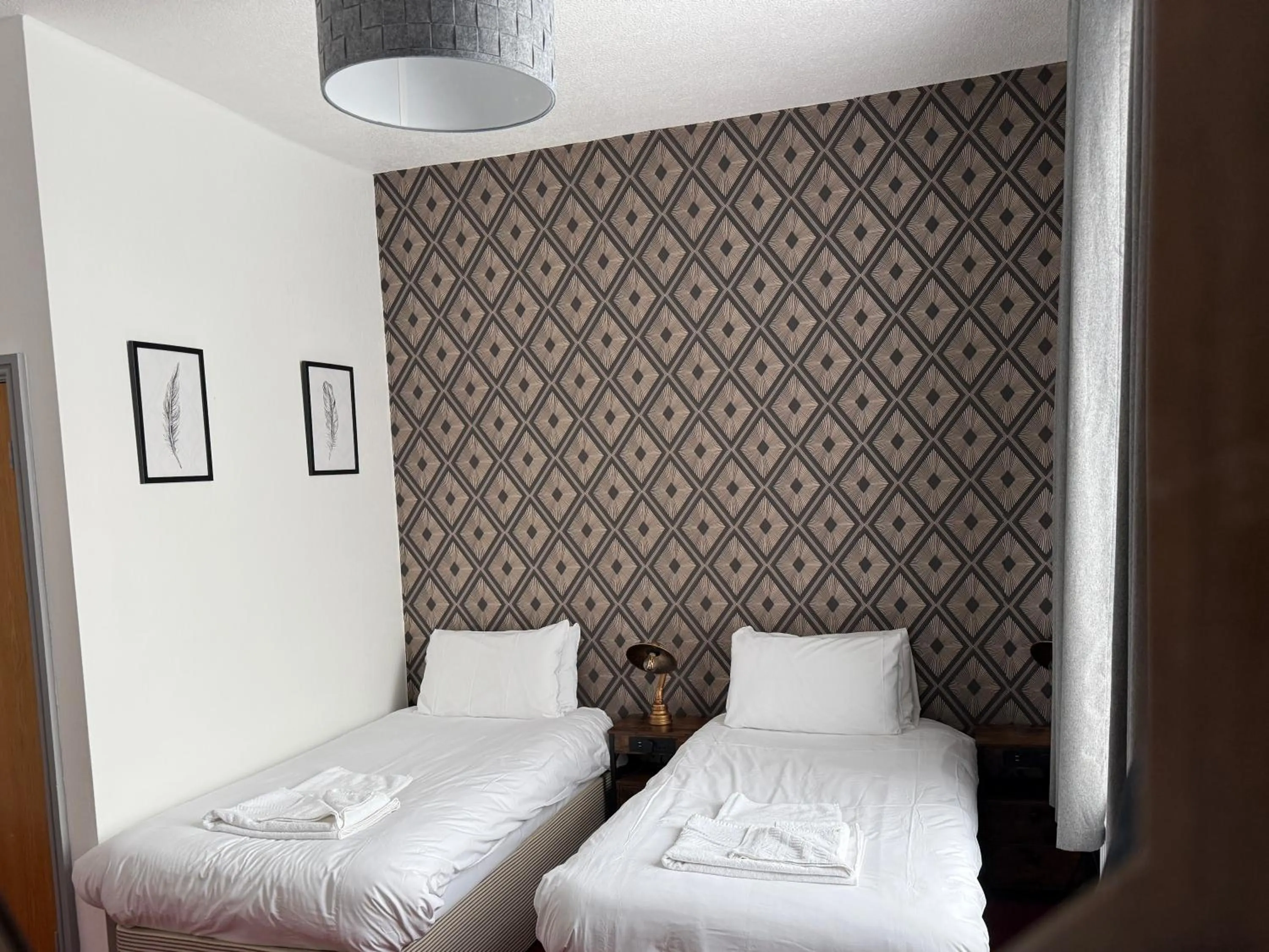 Bed in The Derby Hotel