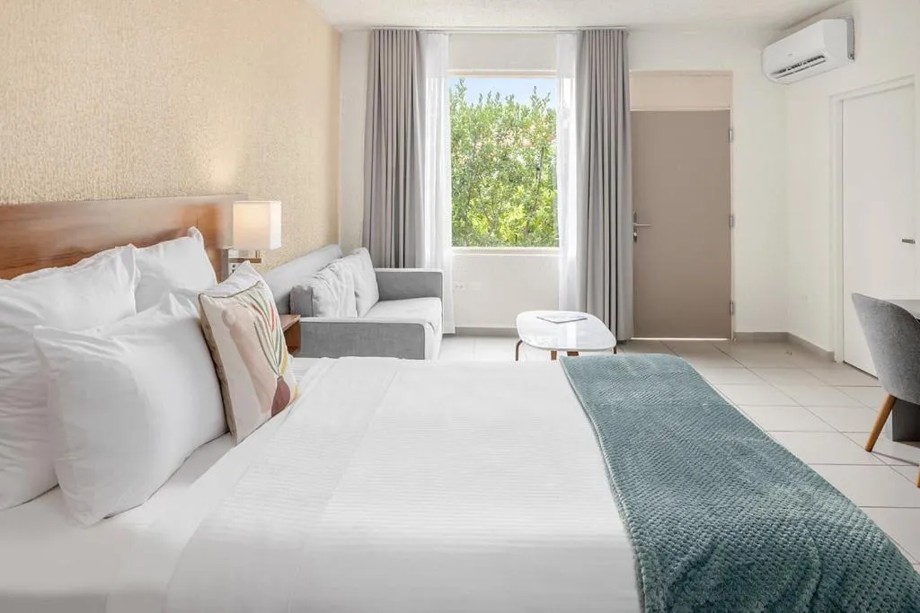 Playa Collection King Studio with Garden view in Wyndham Palmas Beach and Golf Boutique Resort