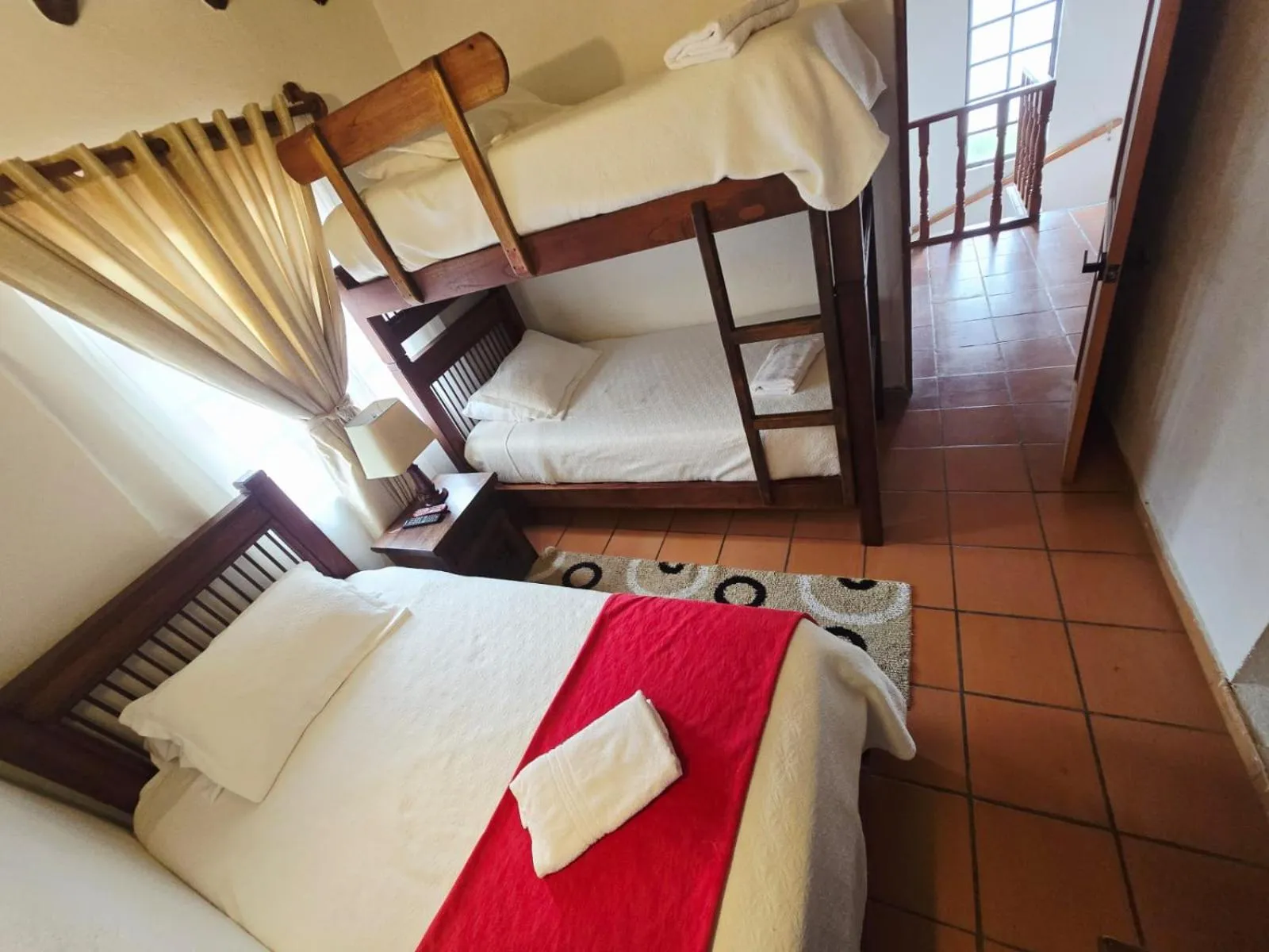 Photo of the whole room, Bed in Aparta Hotel El Refugio de María