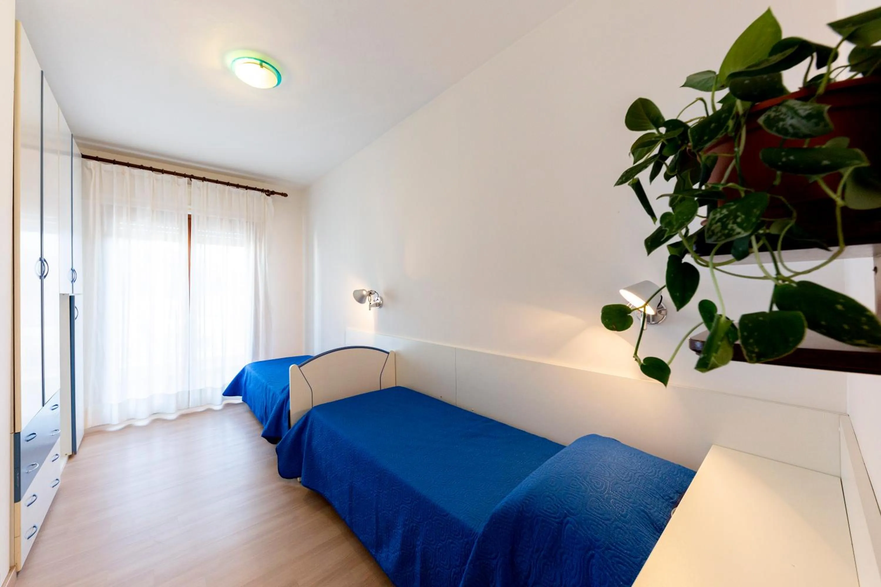 Bed in Holiday Appartamenti