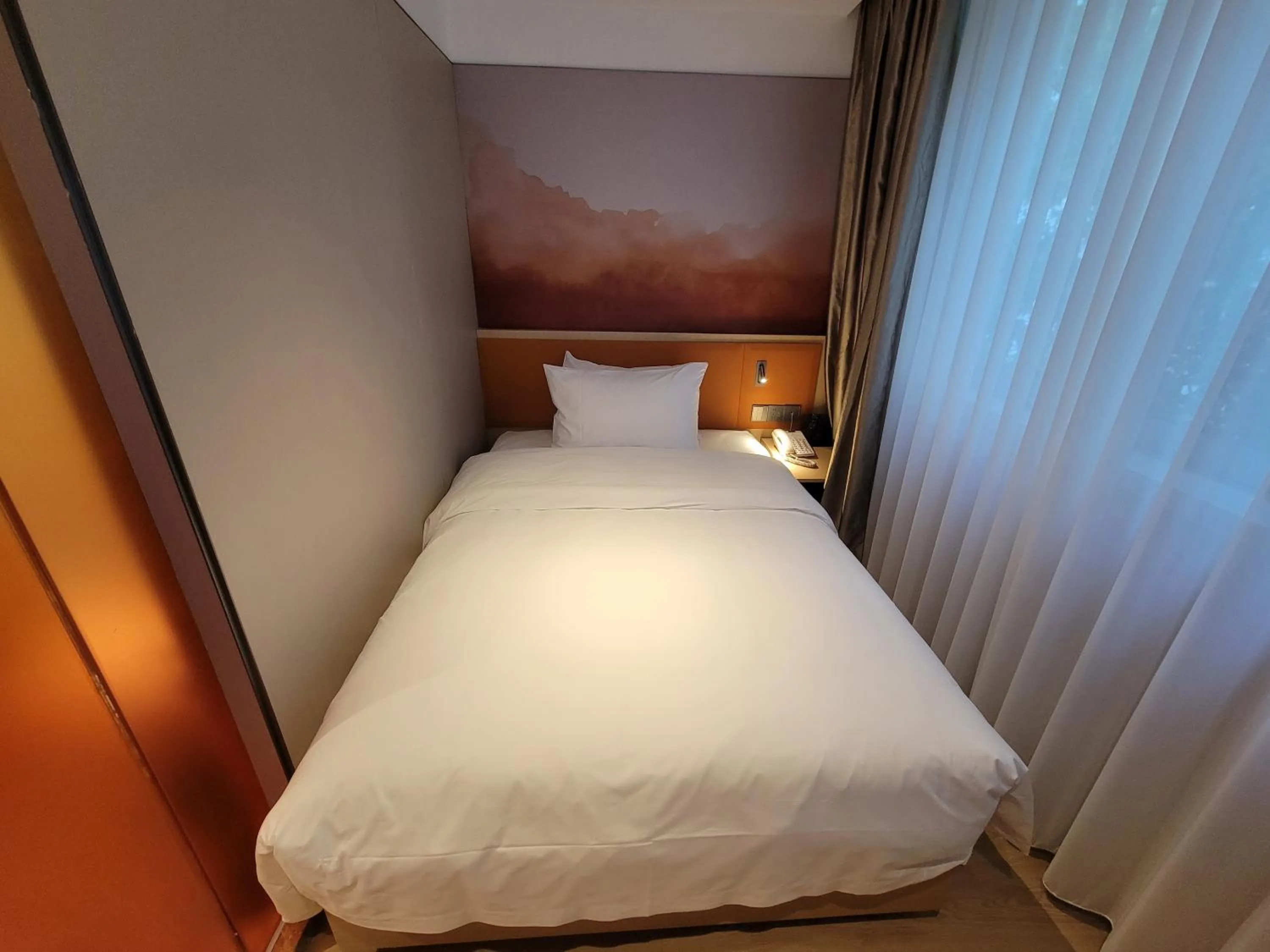 Bed in Guangdong Baiyun City Hotel