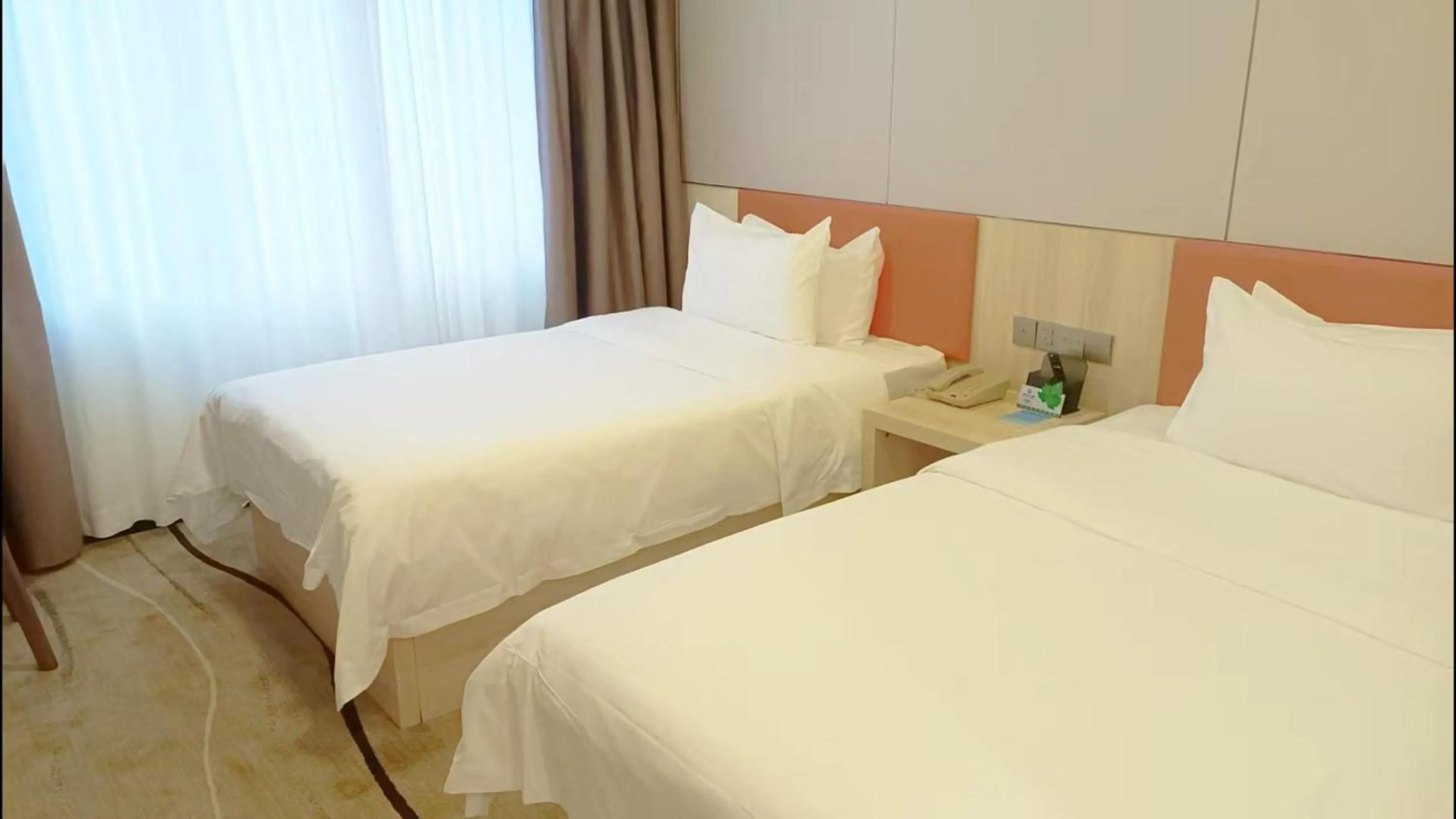 Bed in Guangdong Baiyun City Hotel