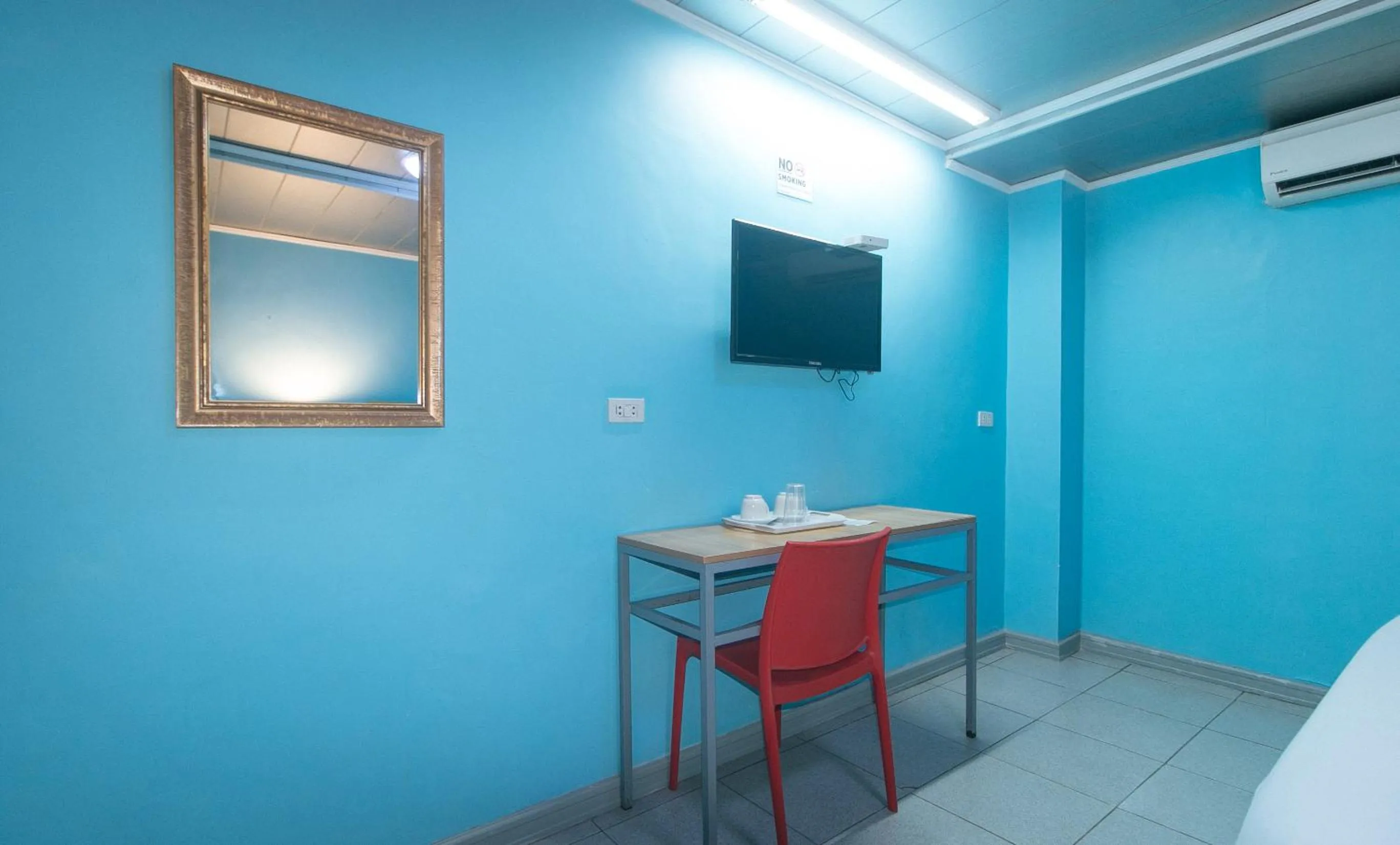 TV and multimedia, Bed in RedDoorz Plus New Era Budget Hotel Mandaue former RedDoorz Plus near UV Mandaue Cebu