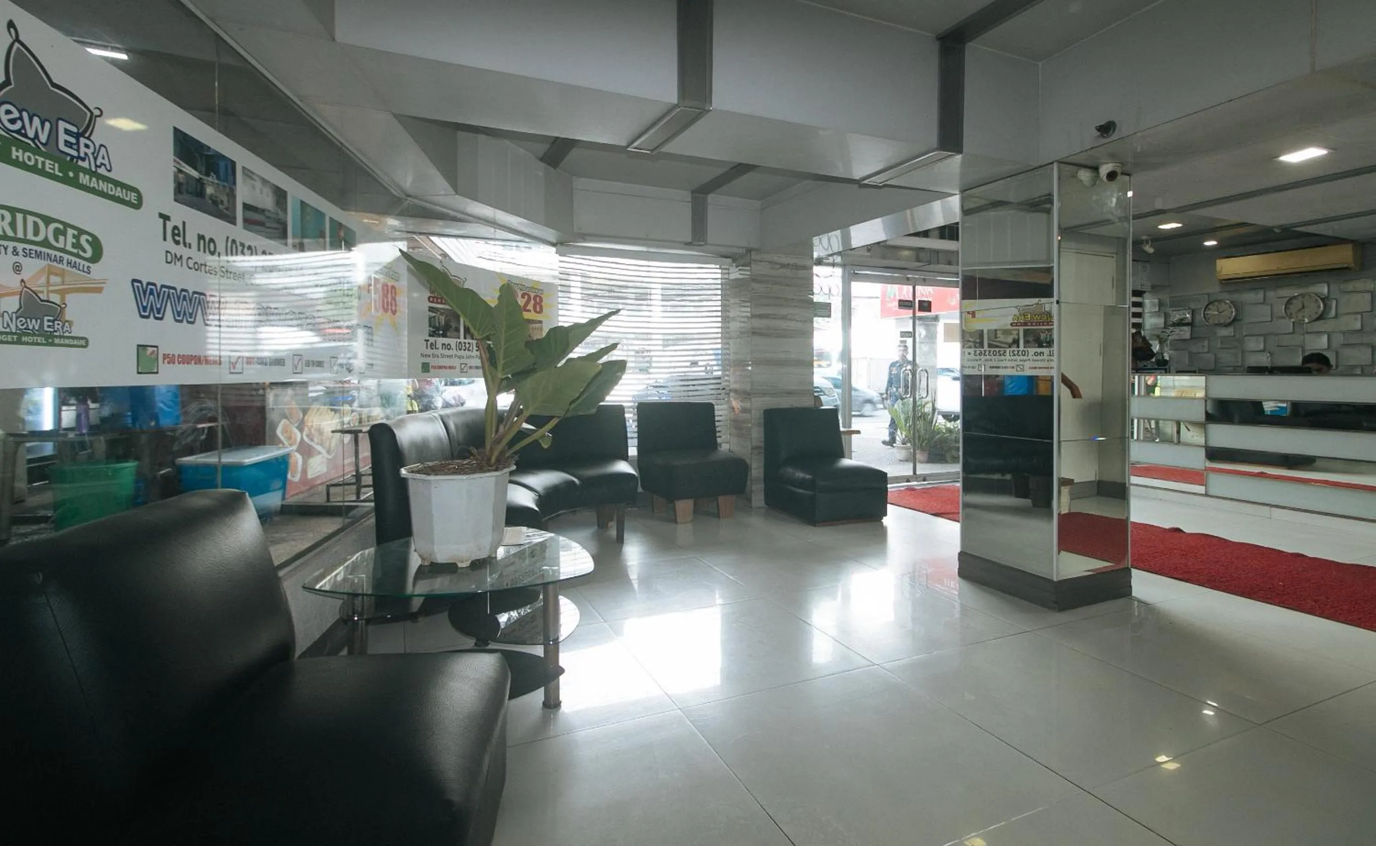 Seating area in RedDoorz Plus New Era Budget Hotel Mandaue former RedDoorz Plus near UV Mandaue Cebu