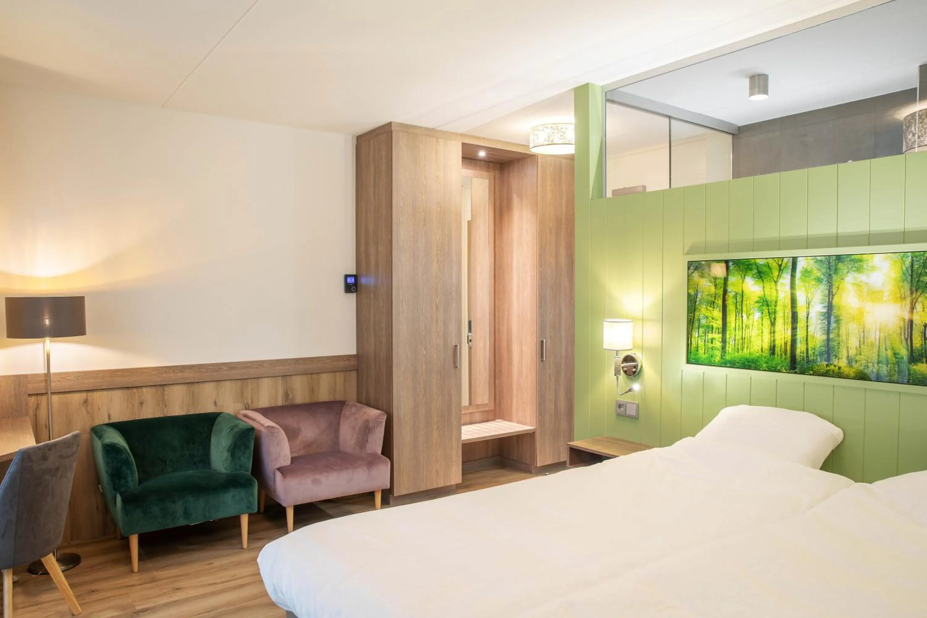 Seating area, Bed in Hotel Erve Hulsbeek