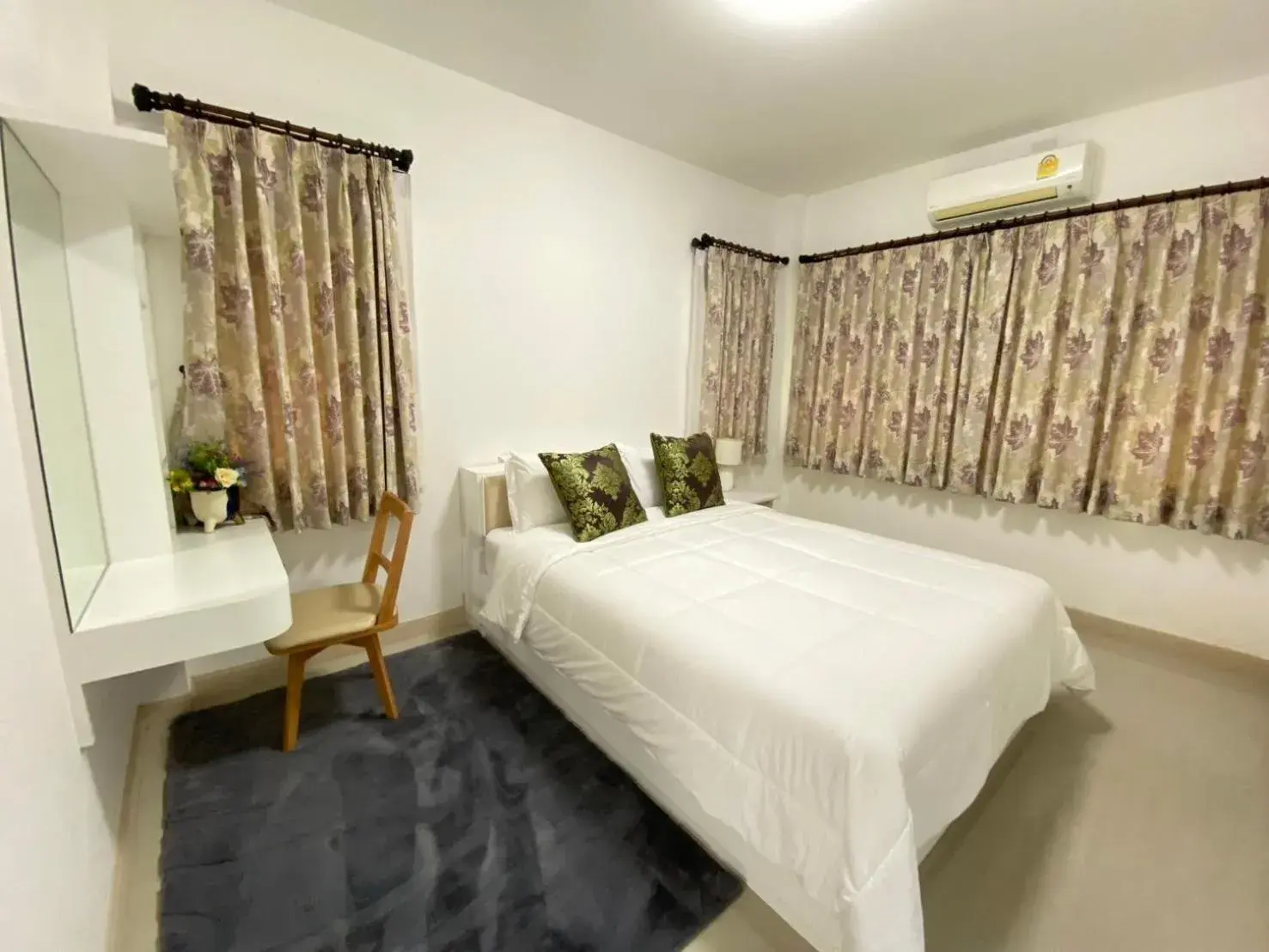 Bed in Baan Pingkan Wellness Resort Bed in Baan Pingkan Wellness Resort