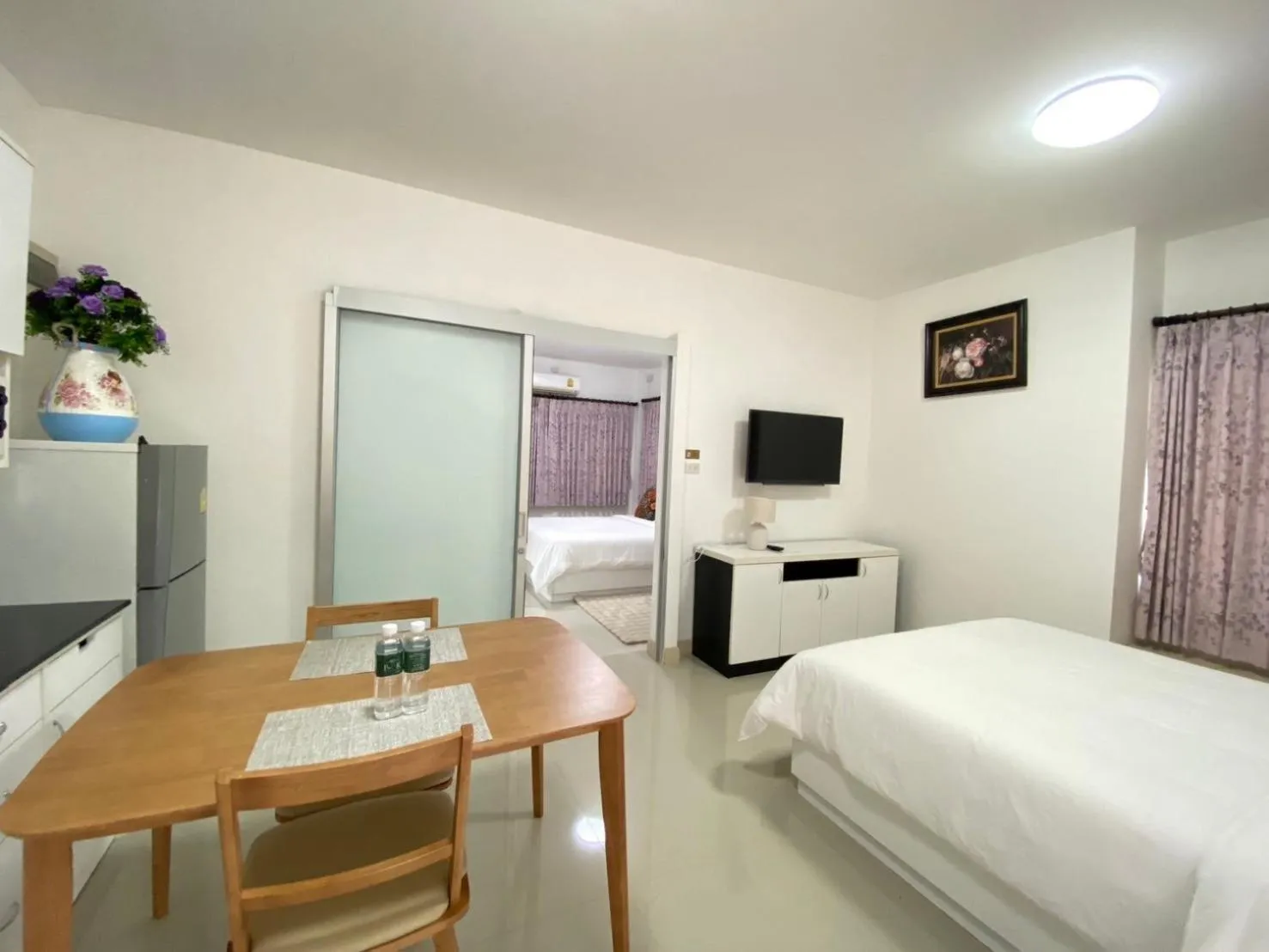 Bed in Baan Pingkan Wellness Resort