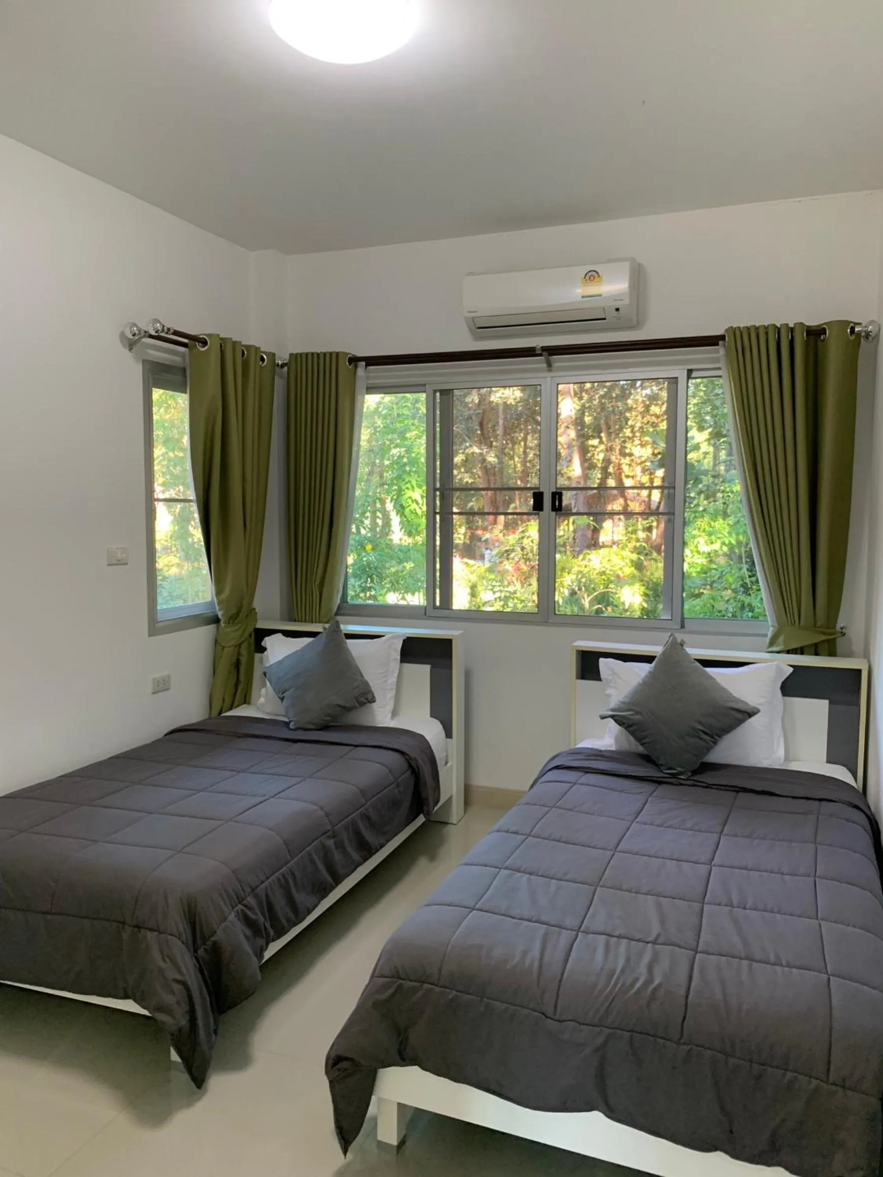 Bed in Baan Ping Kan Longstay