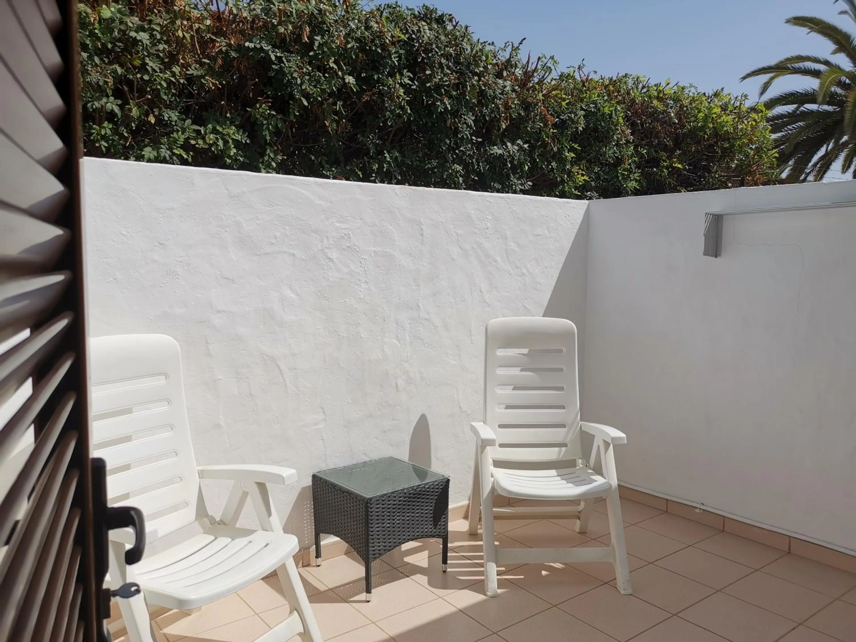 Patio in Rainbow Golf Bungalows, Gay Men-only Resort