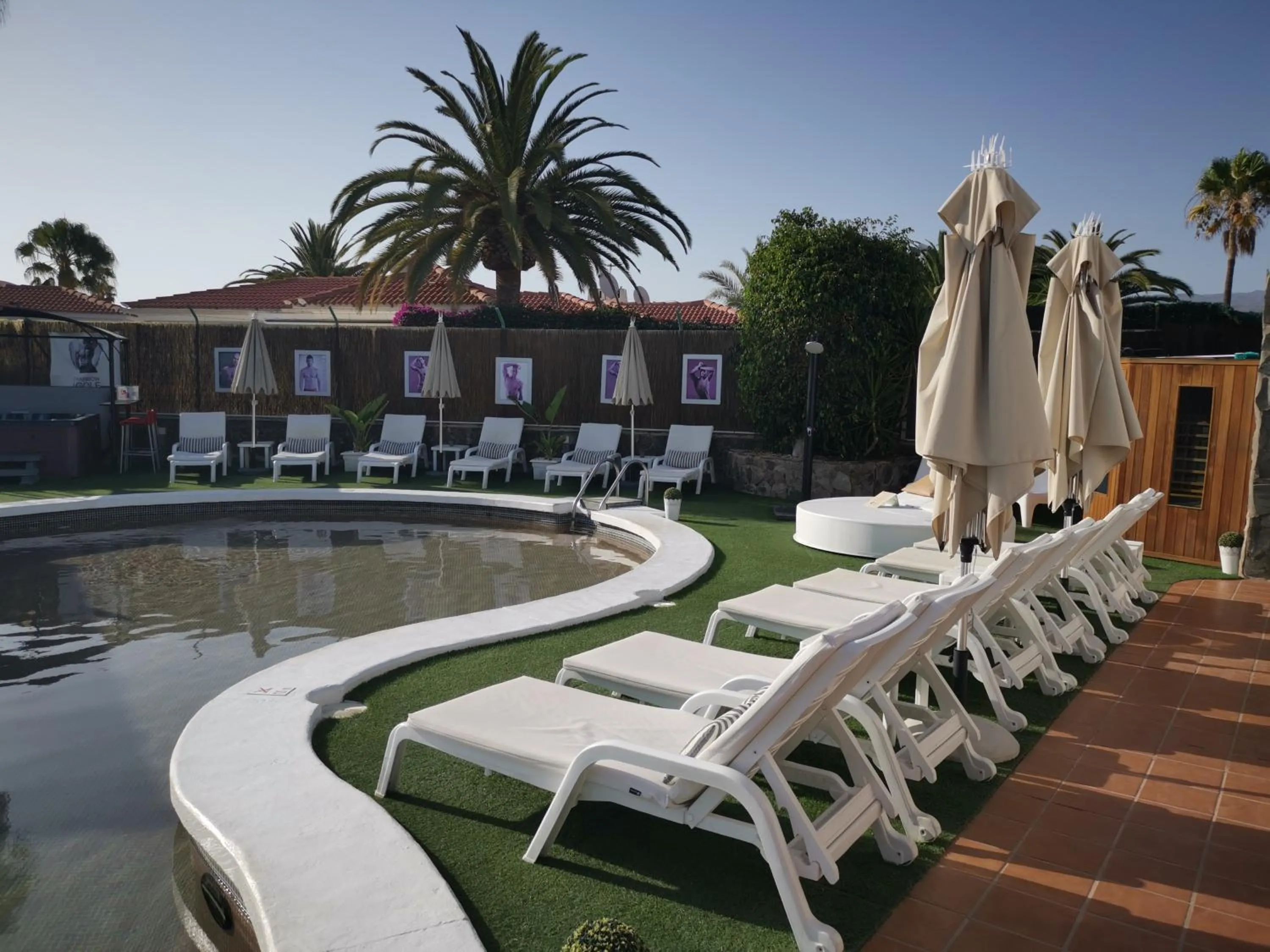 Swimming pool in Rainbow Golf Bungalows, Gay Men-only Resort