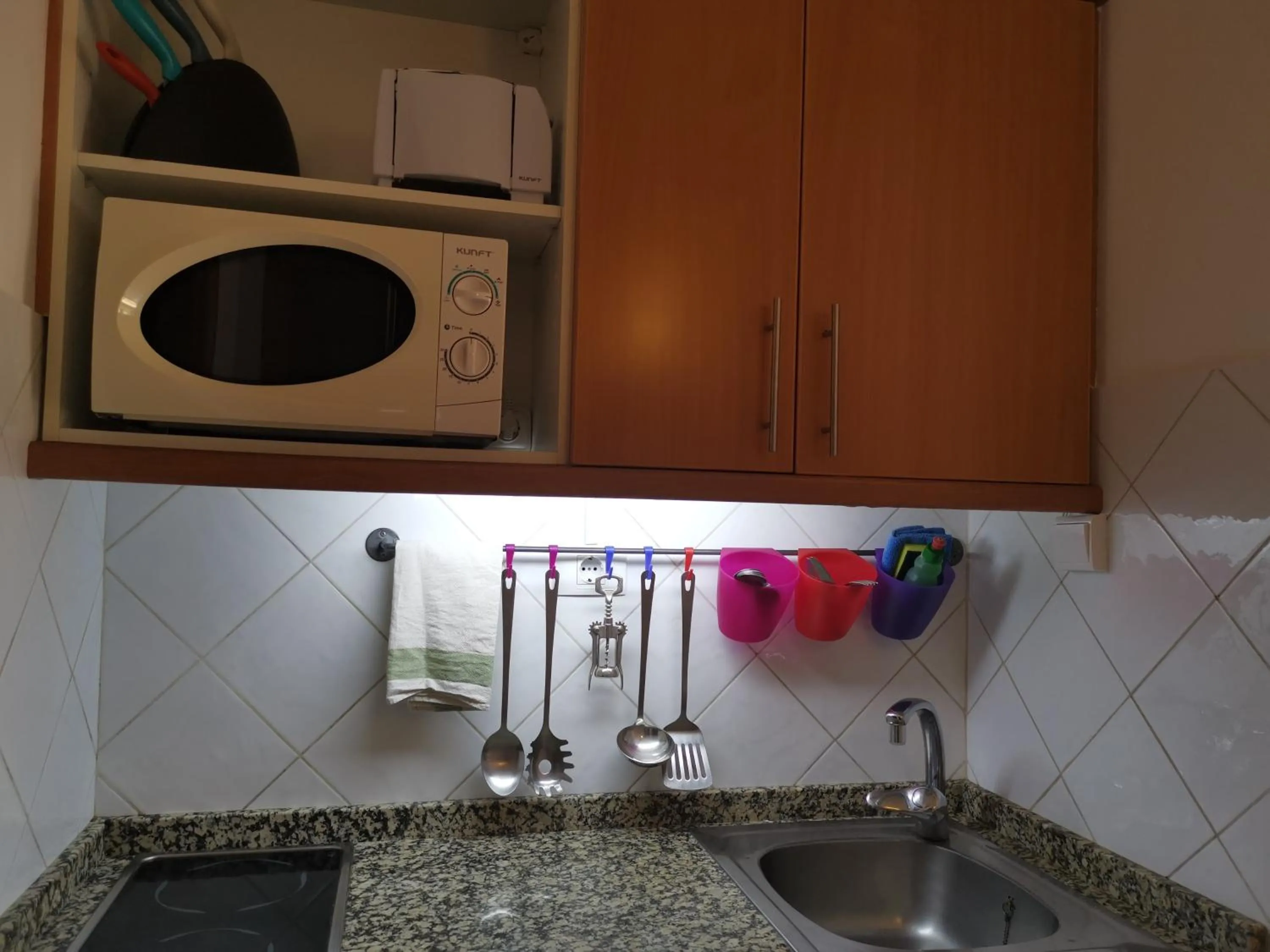 Kitchen or kitchenette in Rainbow Golf Bungalows, Gay Men-only Resort