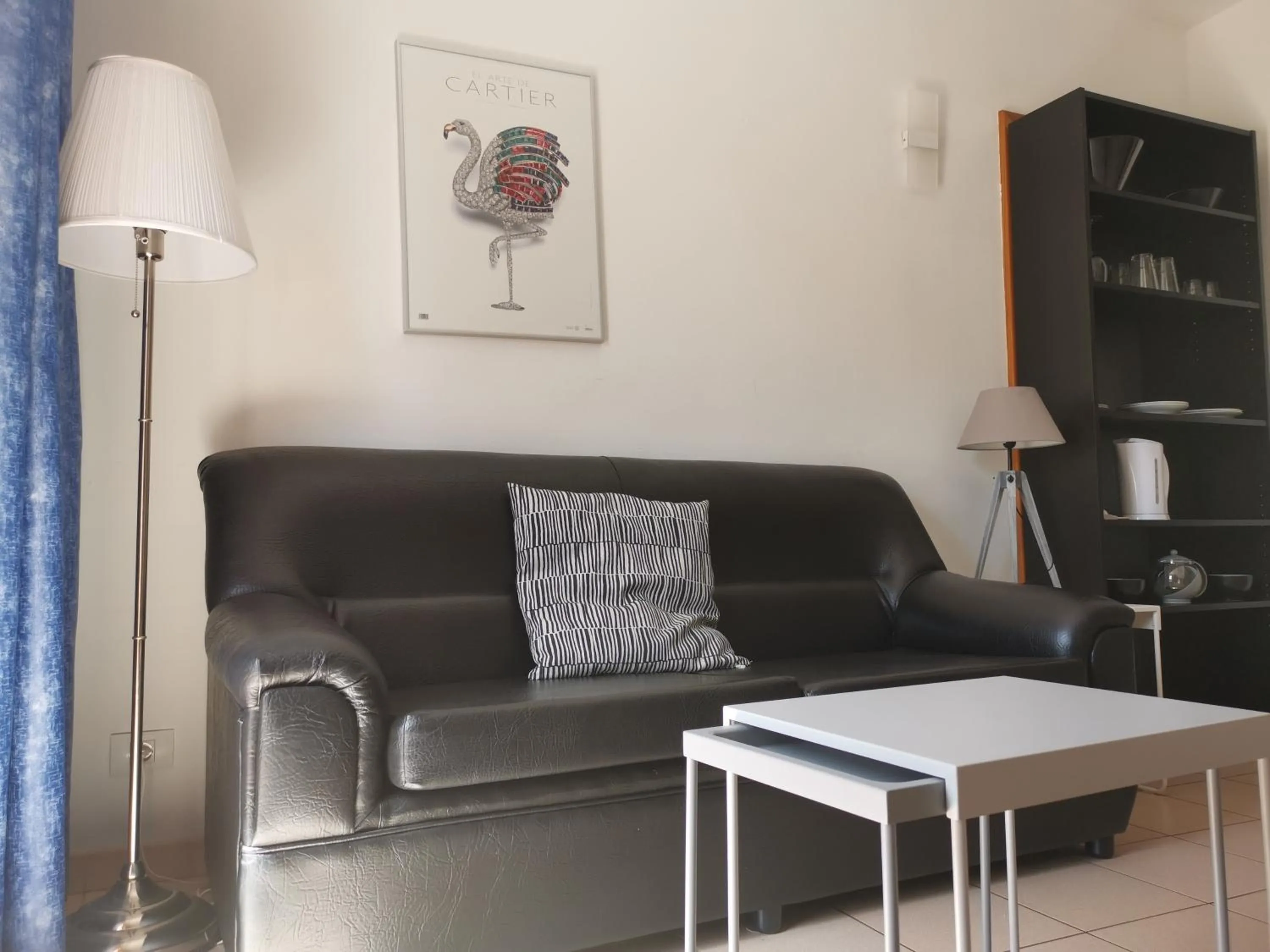 Living room in Rainbow Golf Bungalows, Gay Men-only Resort