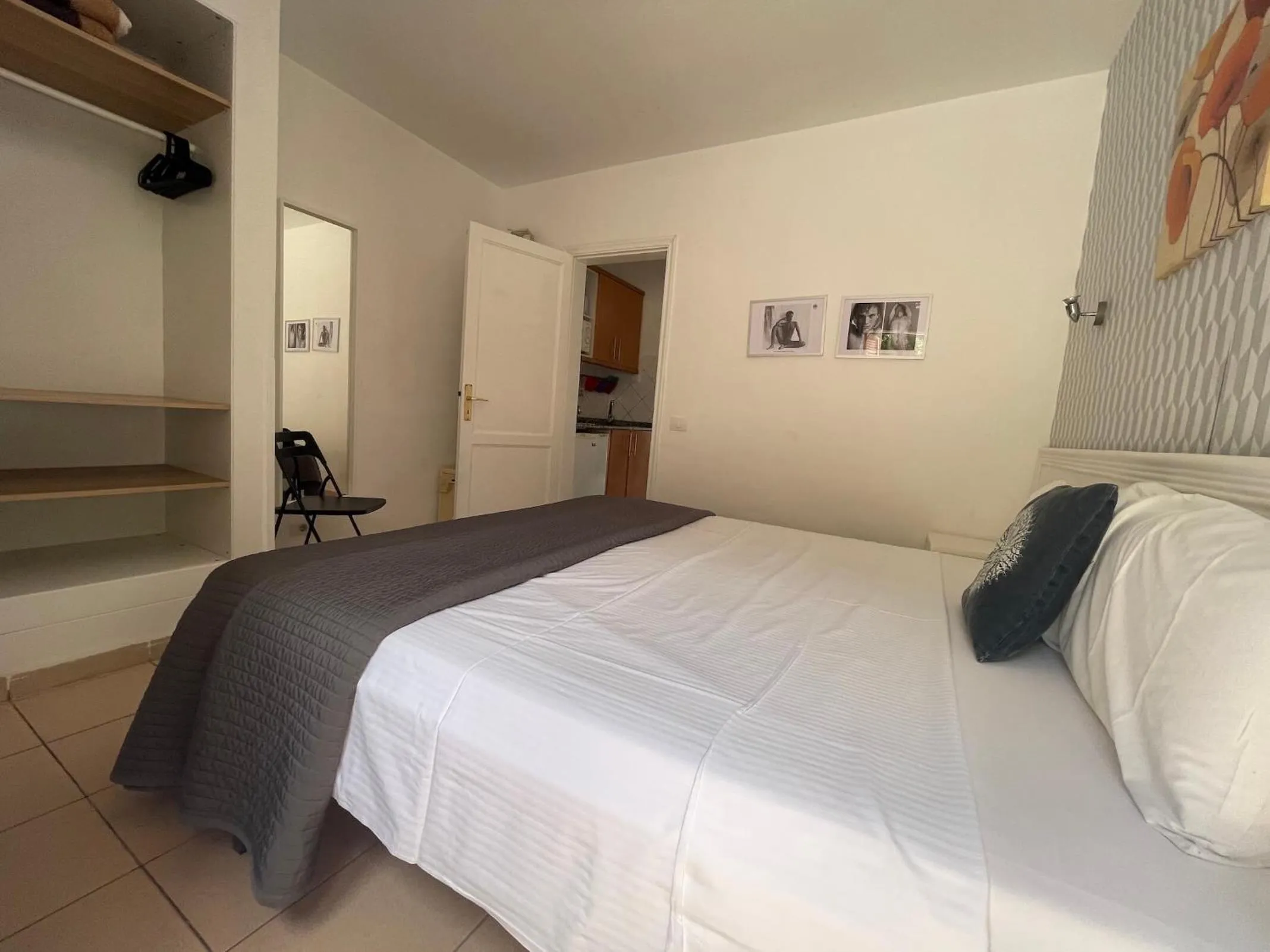 Bed in Rainbow Golf Bungalows, Gay Men-only Resort