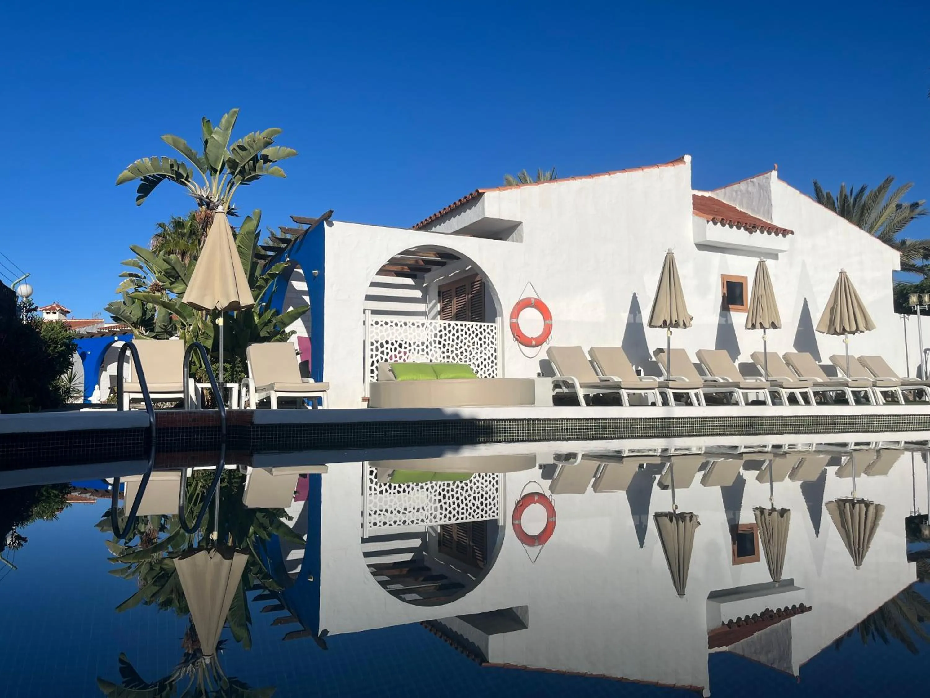 Swimming pool in Rainbow Golf Bungalows, Gay Men-only Resort