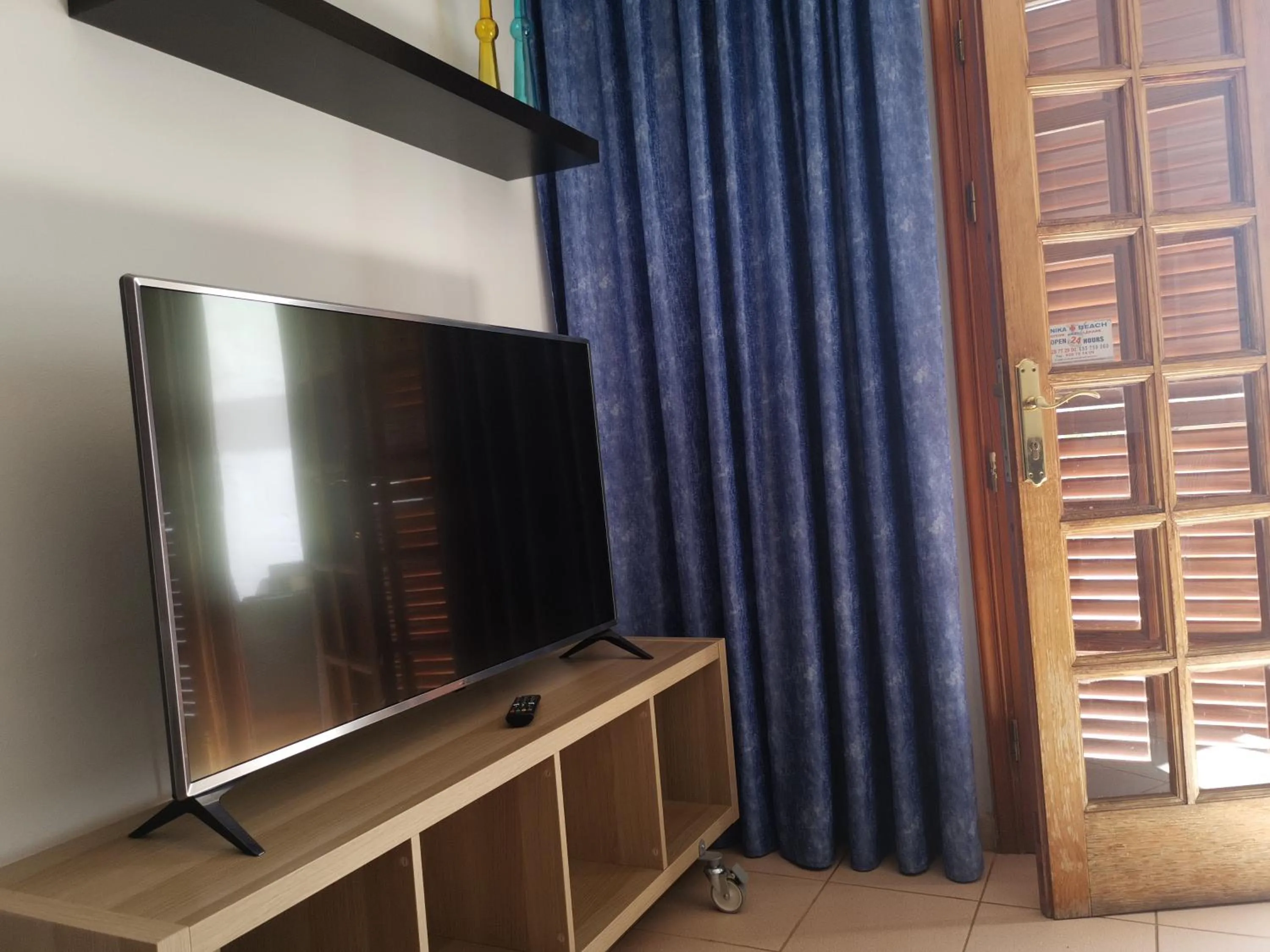 TV and multimedia in Rainbow Golf Bungalows, Gay Men-only Resort