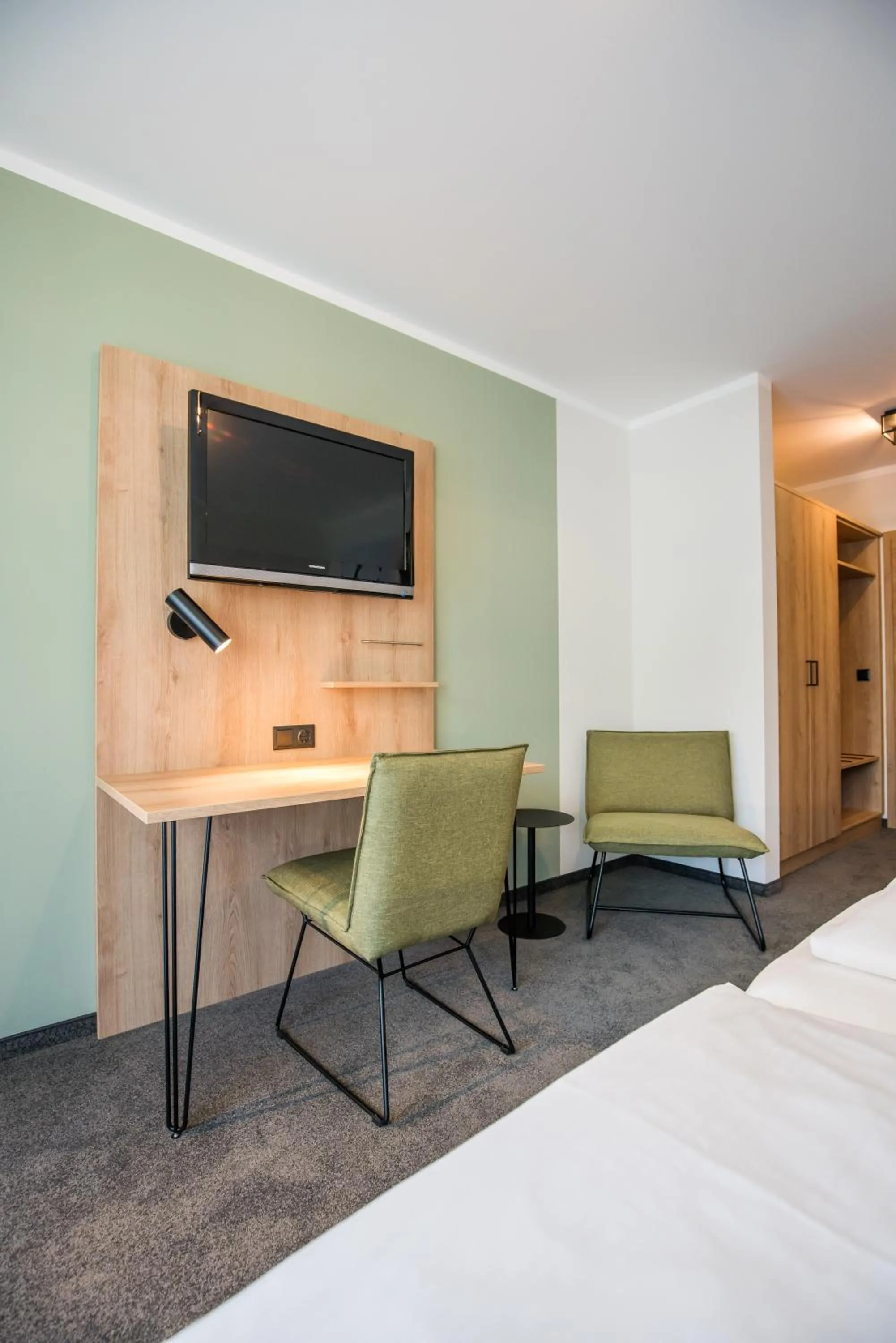 Seating area, Bed in Hotel Schwan