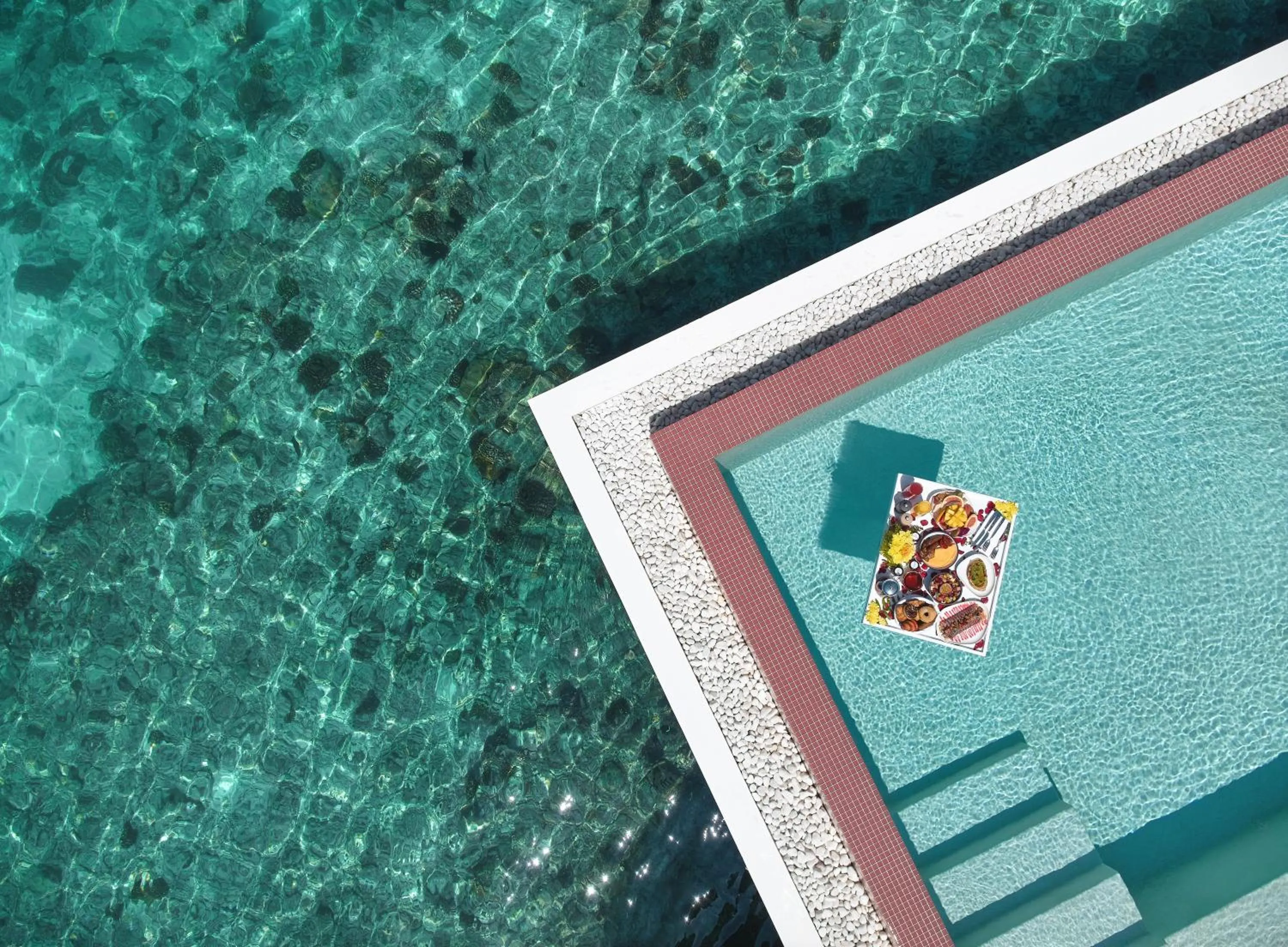 Swimming pool in Jumeirah Olhahali Island Maldives