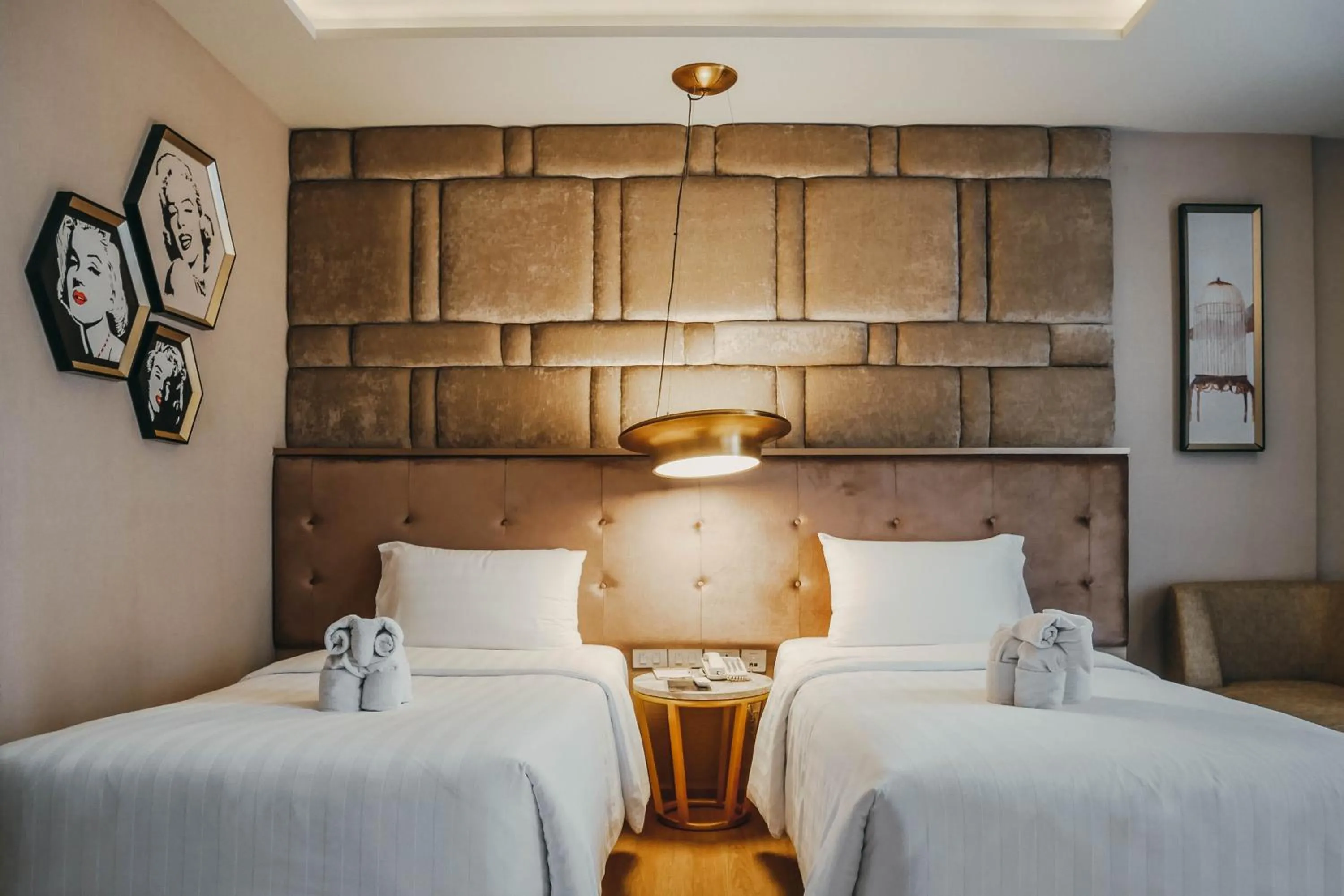 Bed in De Prime Rangnam Hotel