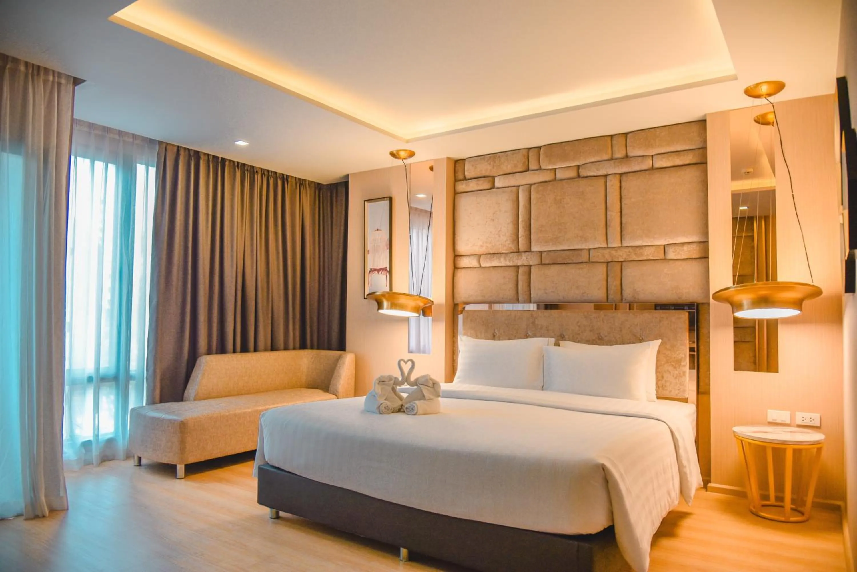 Bed in De Prime Rangnam Hotel