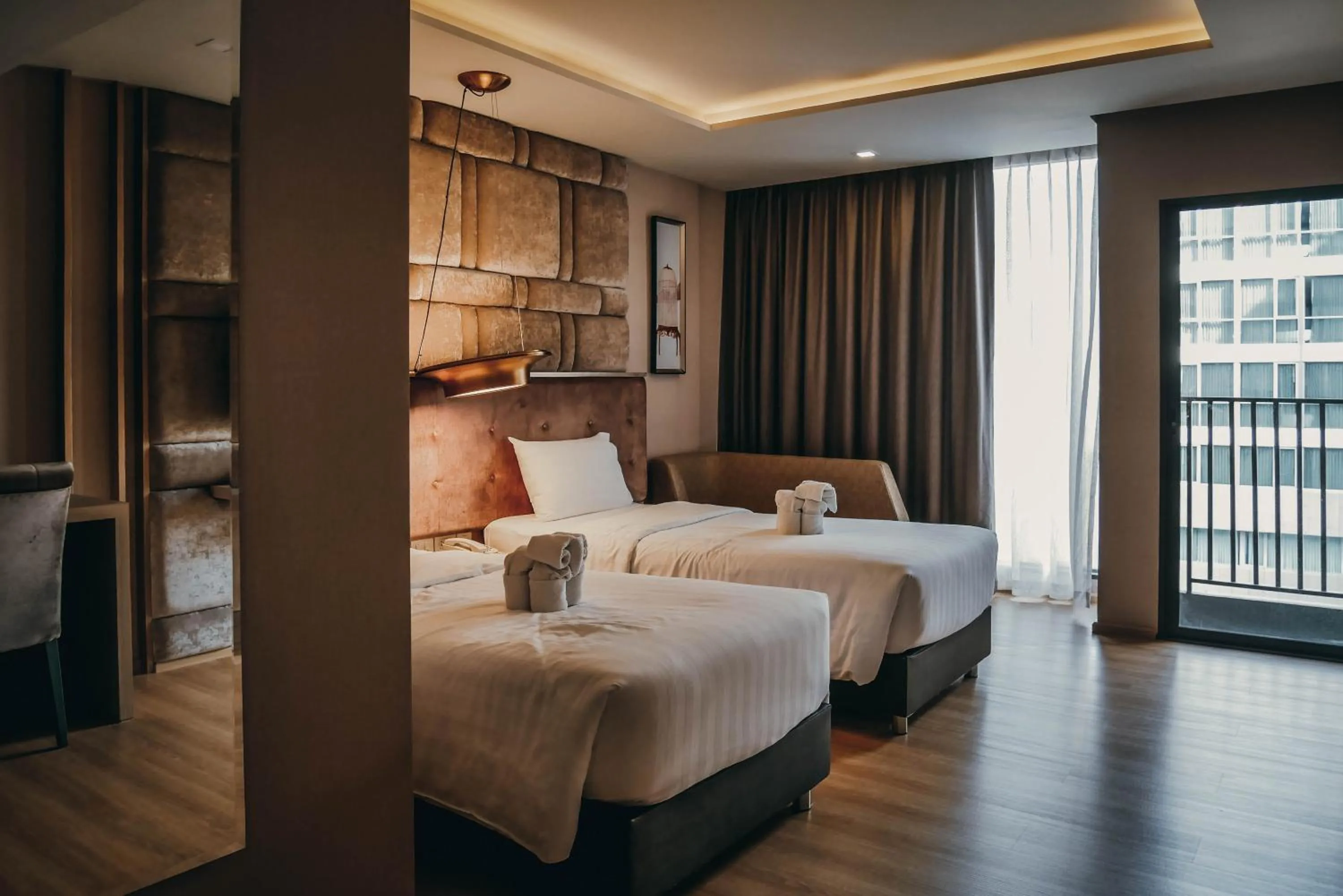 Bed in De Prime Rangnam Hotel