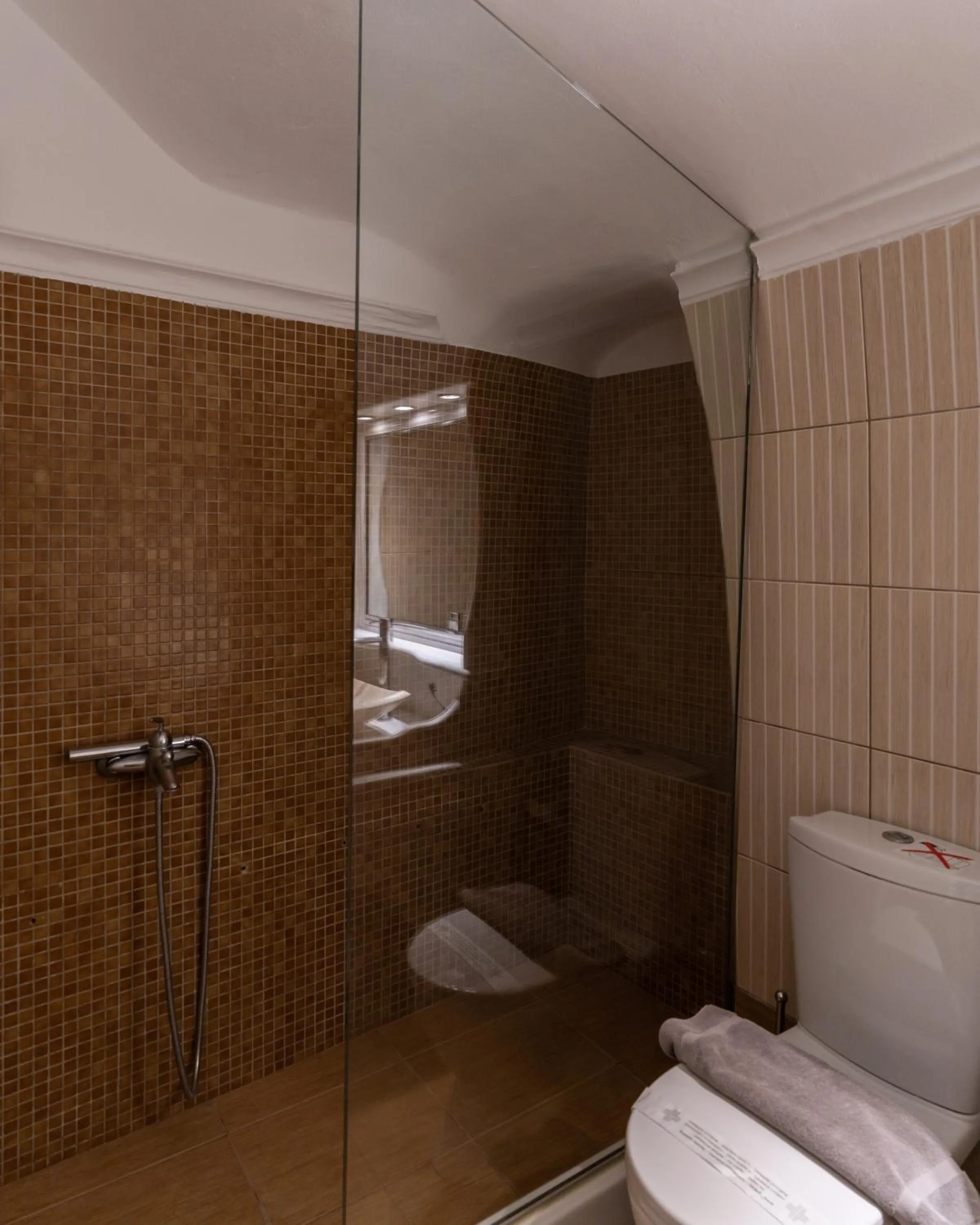 Shower in Nefeli Homes - Adults Only