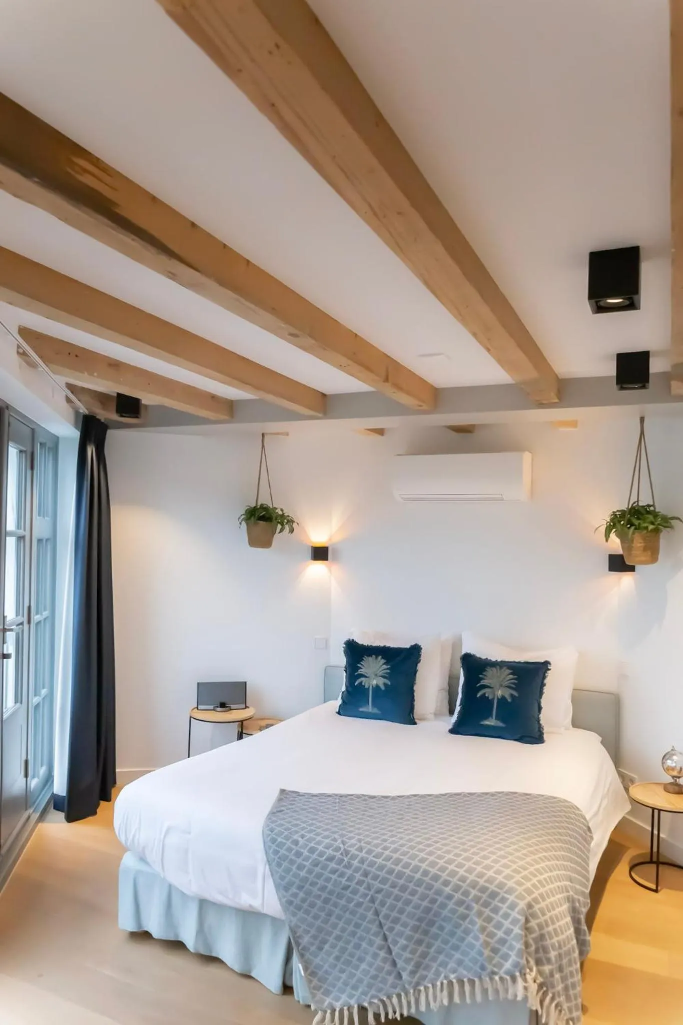 Bed in Canal view suite