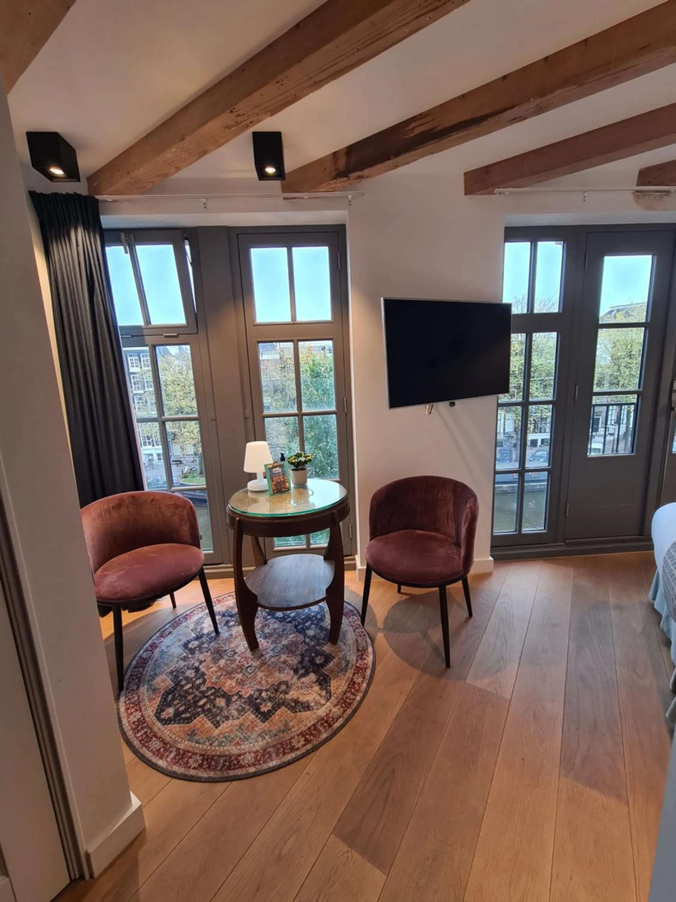 Living room in Canal view suite