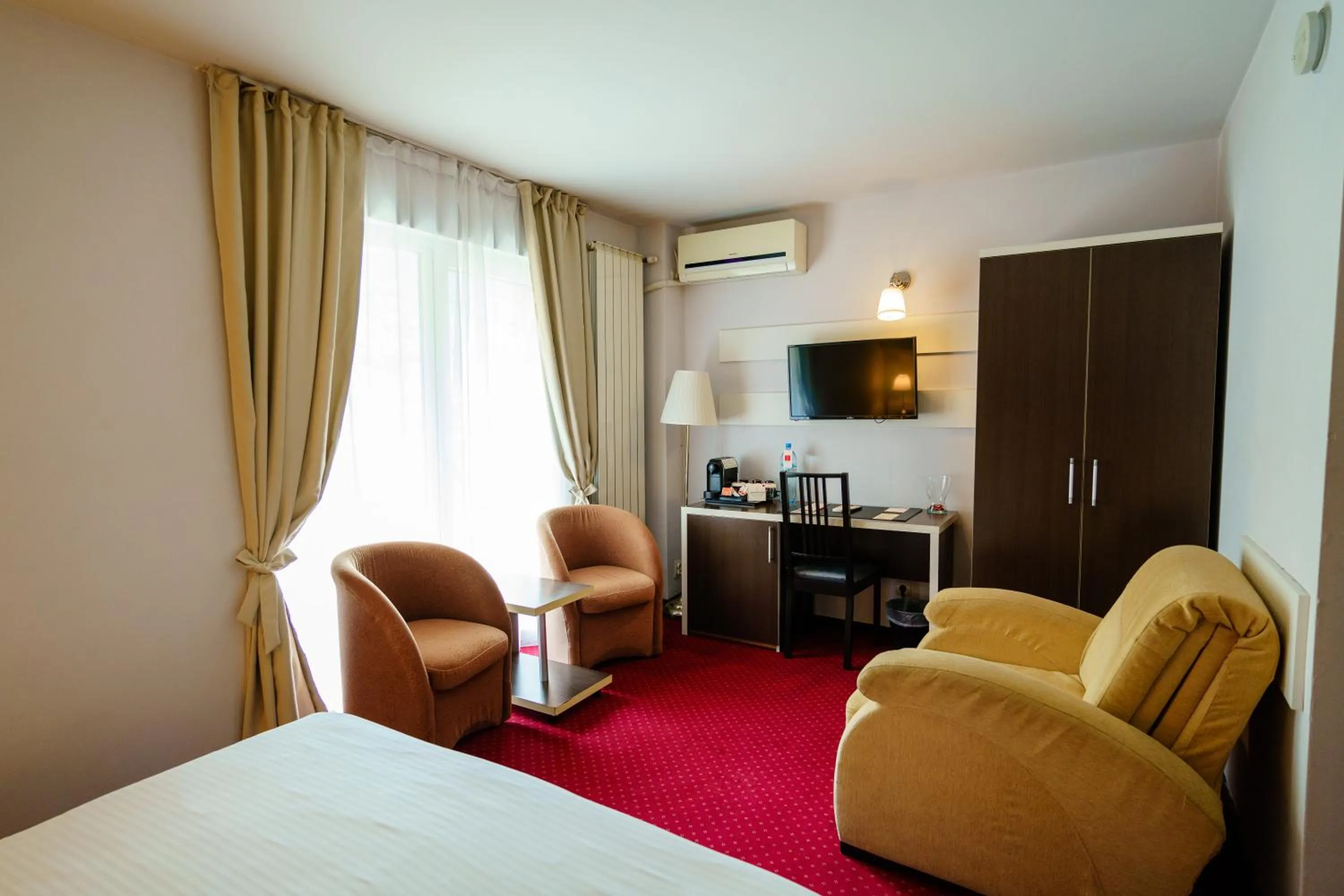 Seating area, Bed in Bacolux Afrodita, Herculane