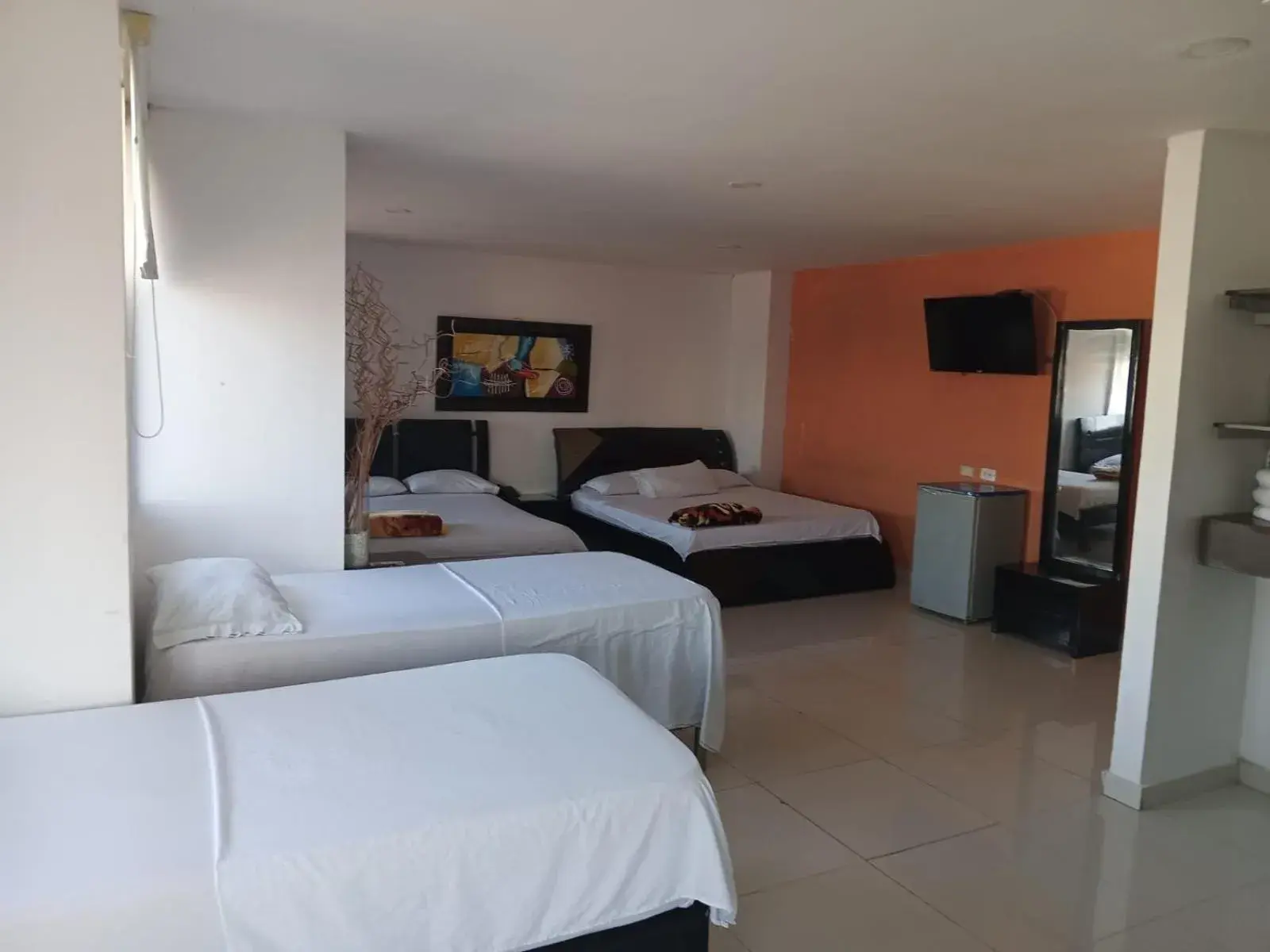 Quadruple Room with Private Bathroom in Hotel Intersuites Quadruple Room with Private Bathroom in Hotel Intersuites